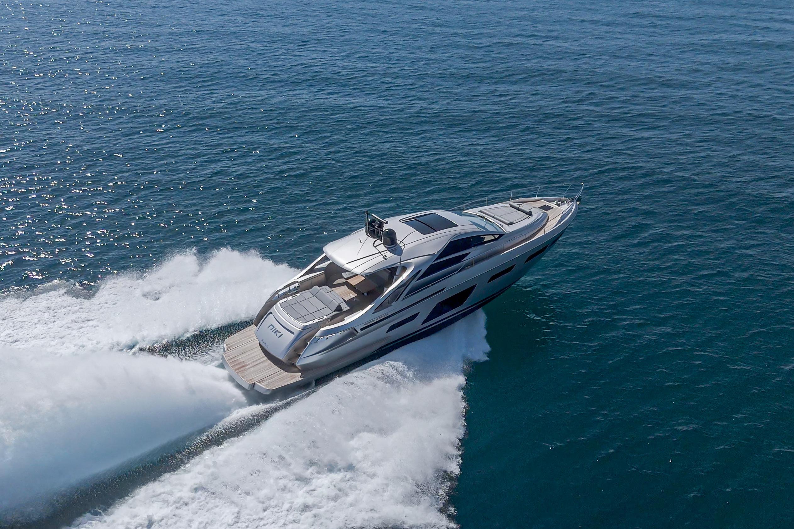 2024 Pershing 7X yacht cruising swiftly on open sea waters.