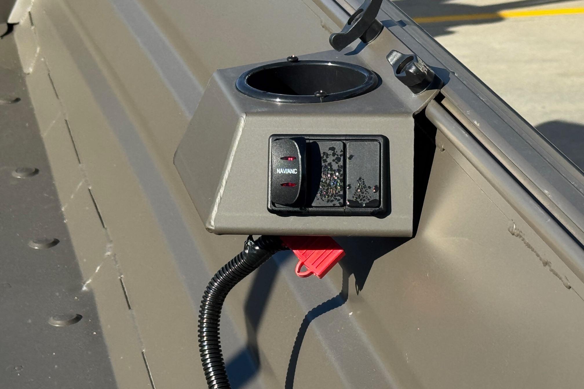 Control panel of 2026 Alweld 1652VV Marsh boat with navigation switch.