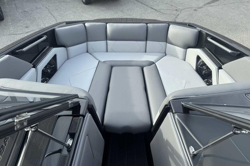 2026 Moomba Tykon boat interior with gray seating and modern design.