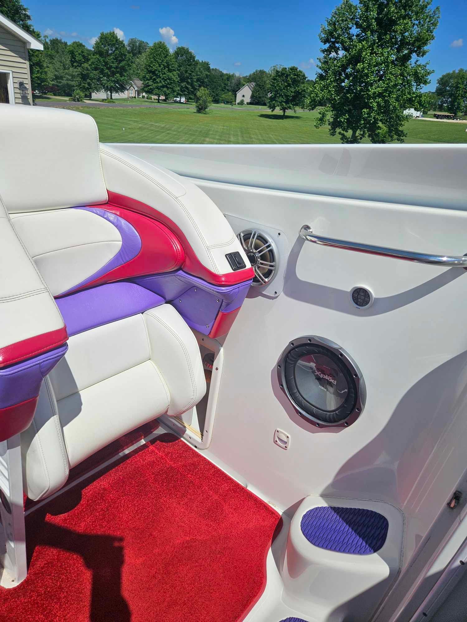 Interior of a 1997 Baja 38 Special Boss boat with colorful seating.