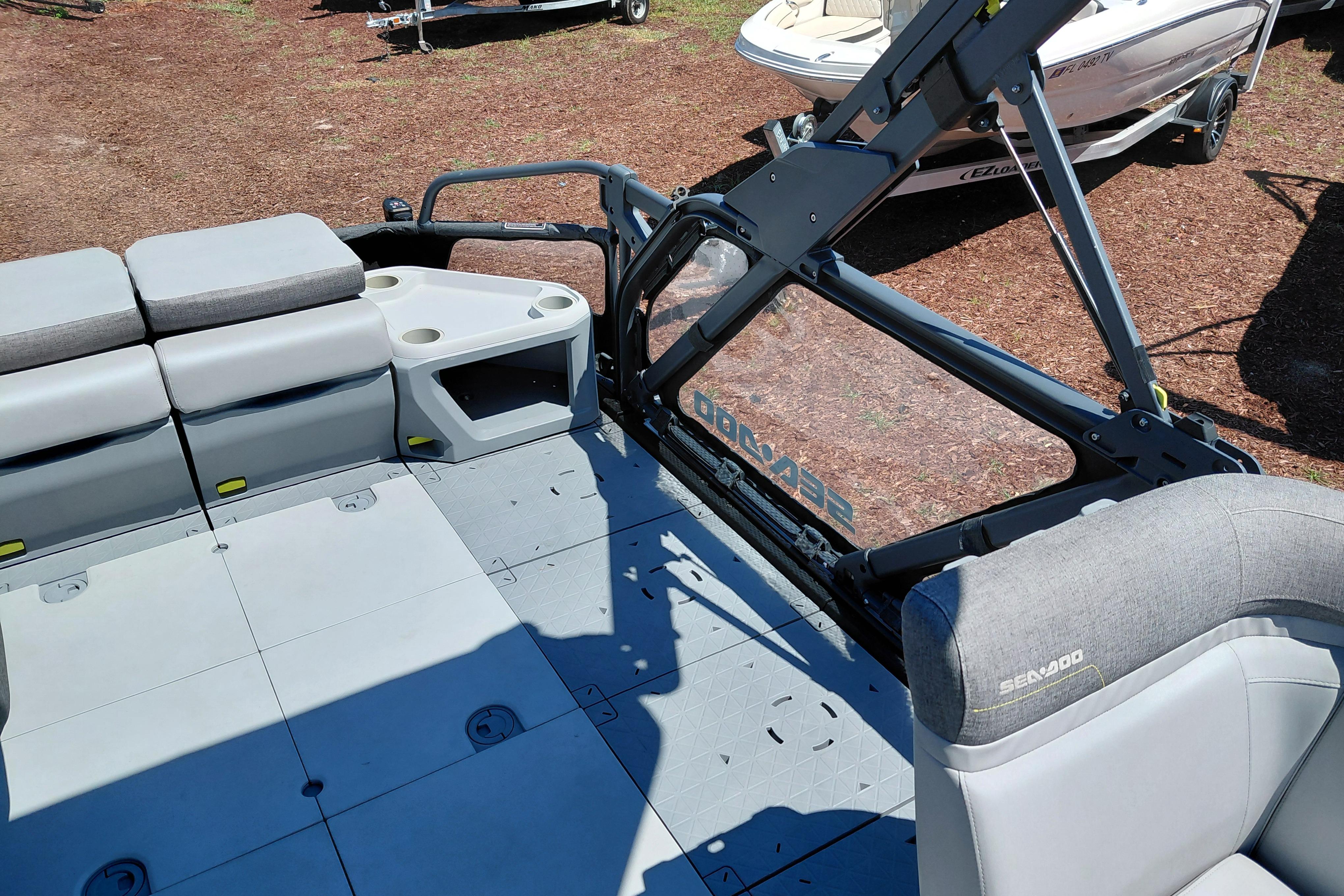 2024 Sea-Doo Switch Cruise 18 interior with gray seating and open deck layout.