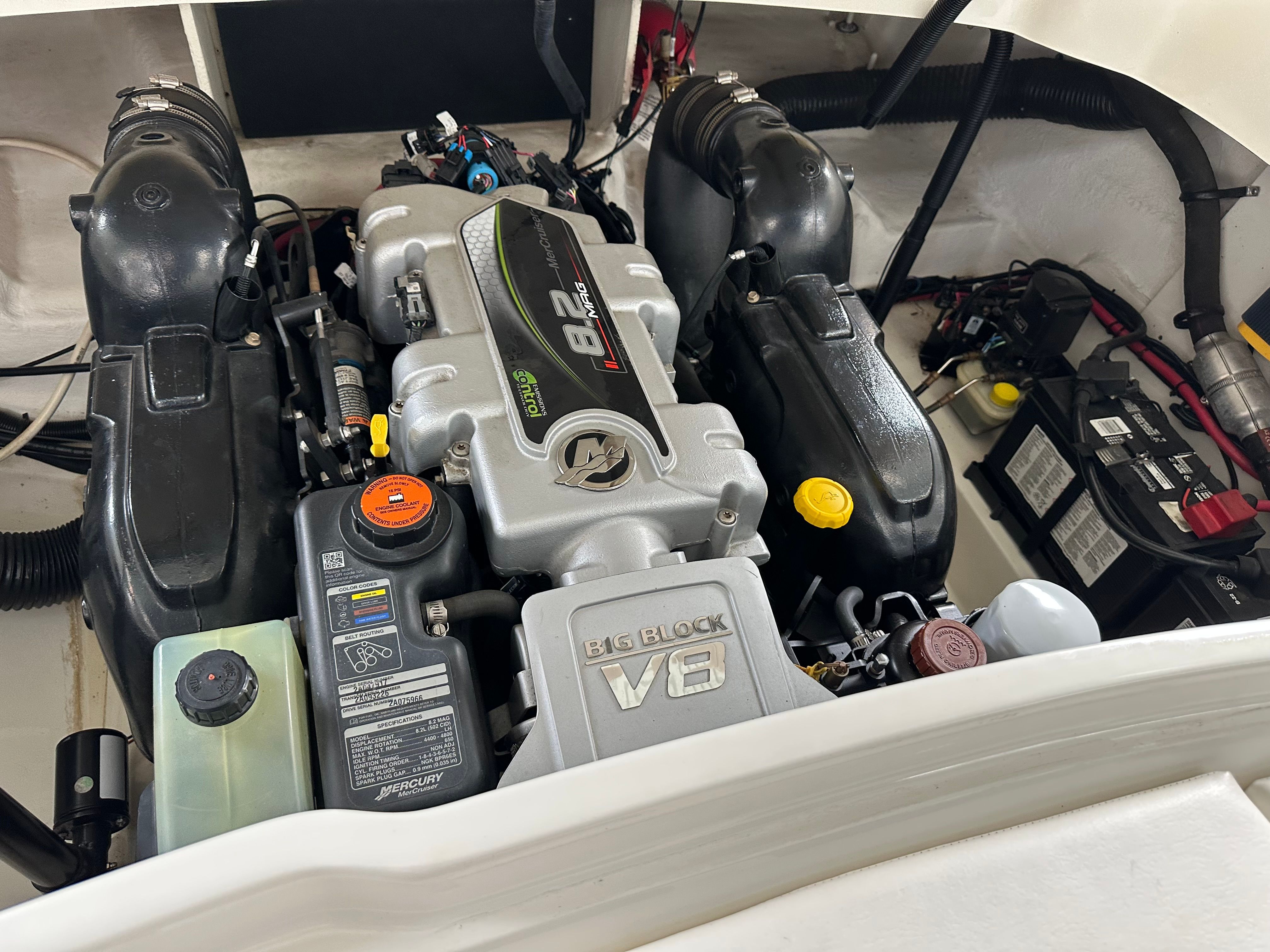 Engine compartment of 2013 Sea Ray SLX 250 boat.