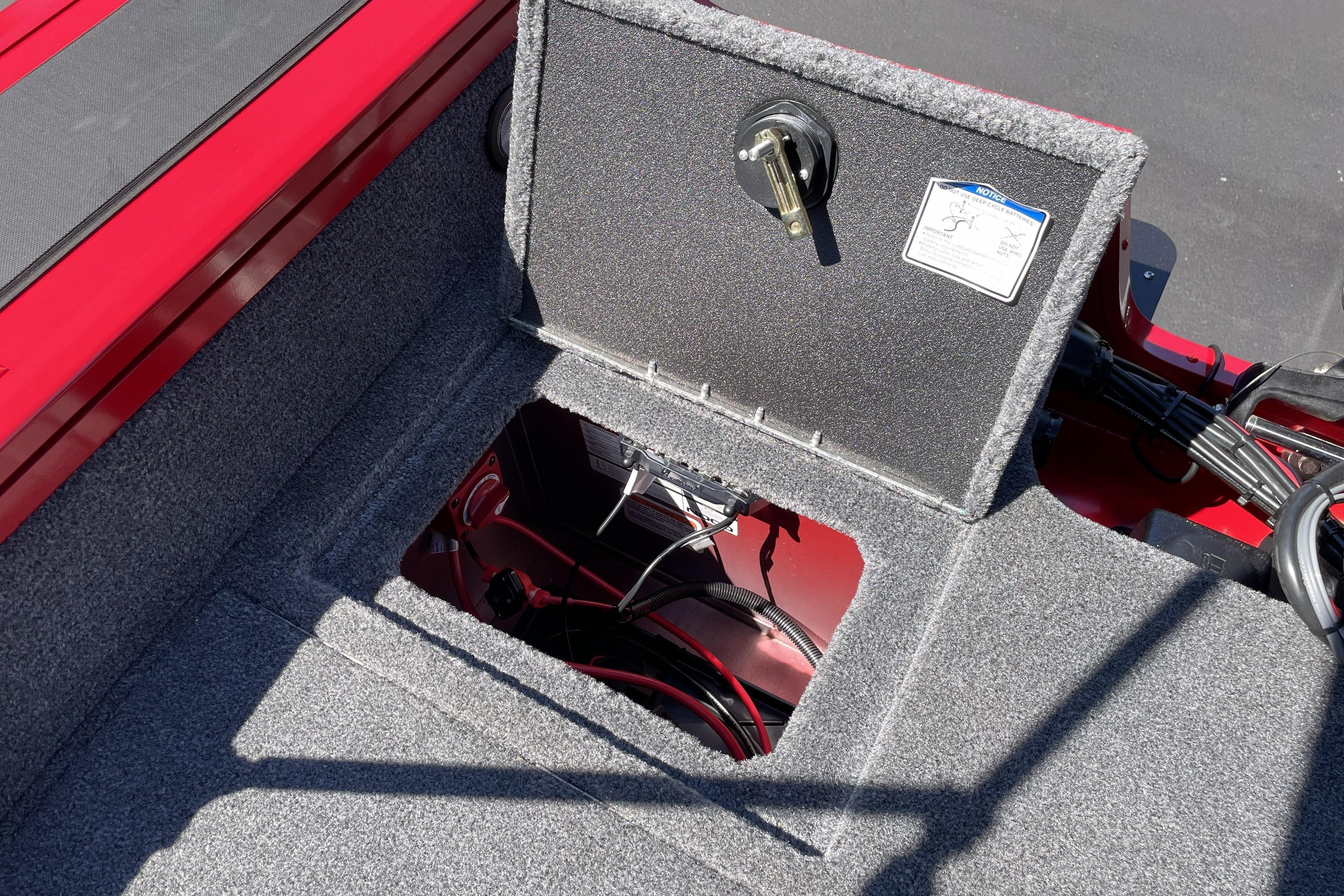 Open storage compartment in Tracker Targa V-18 WT boat, year 2026.