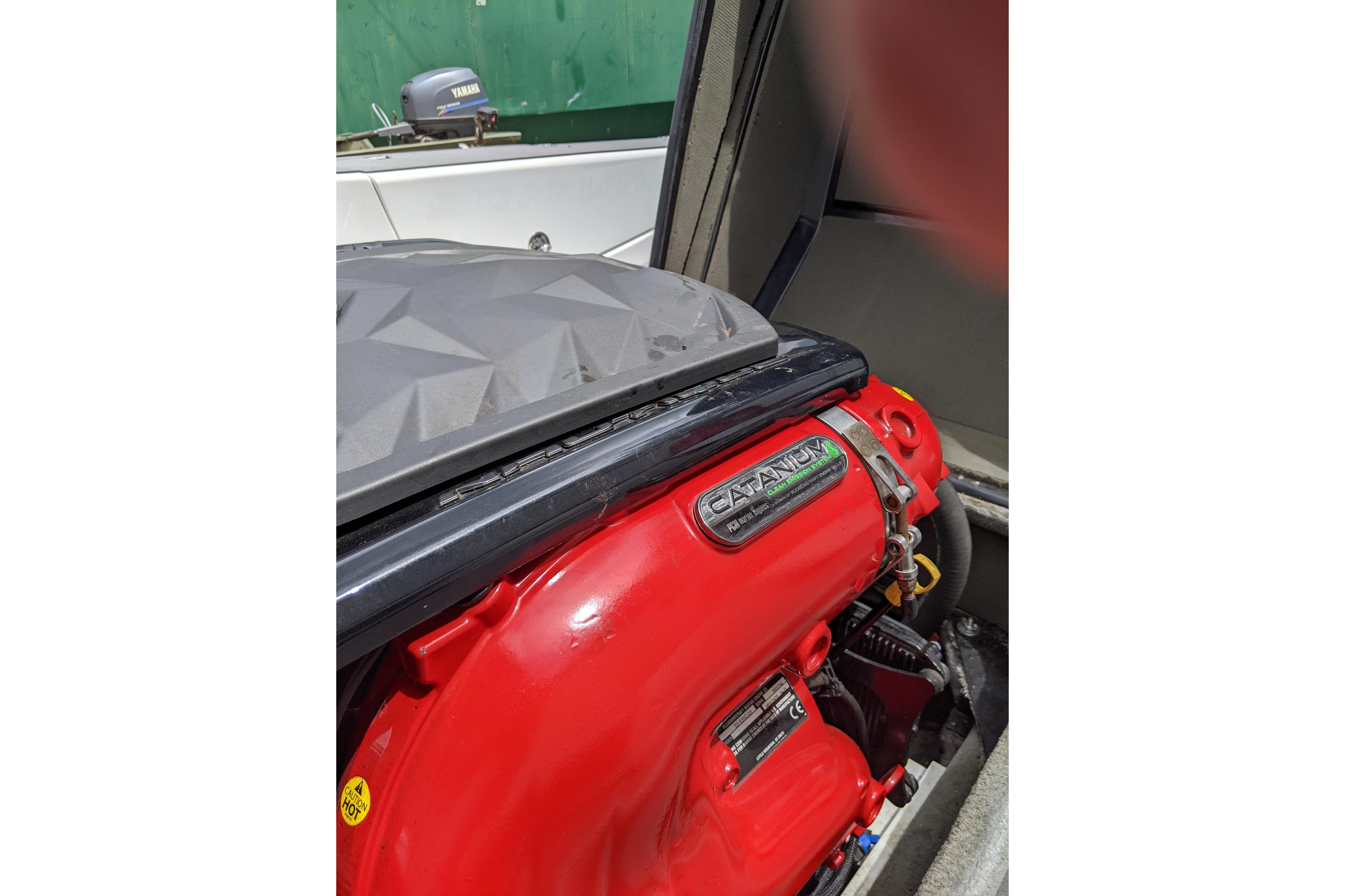 2016 Nautique Ski Nautique 200 engine with red casing and Cataniun branding.