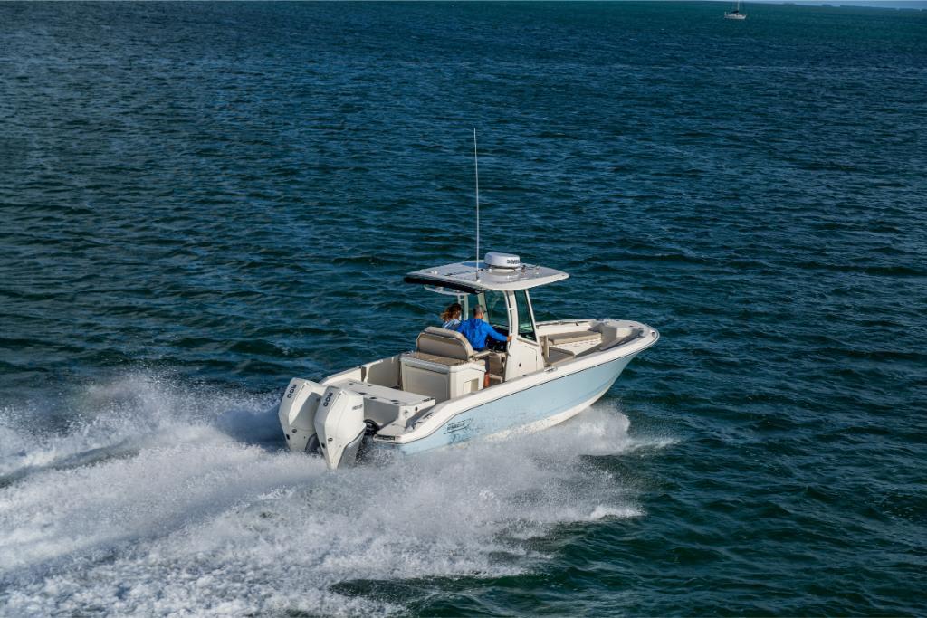 2024 Boston Whaler 280 Dauntless cruising on open water.