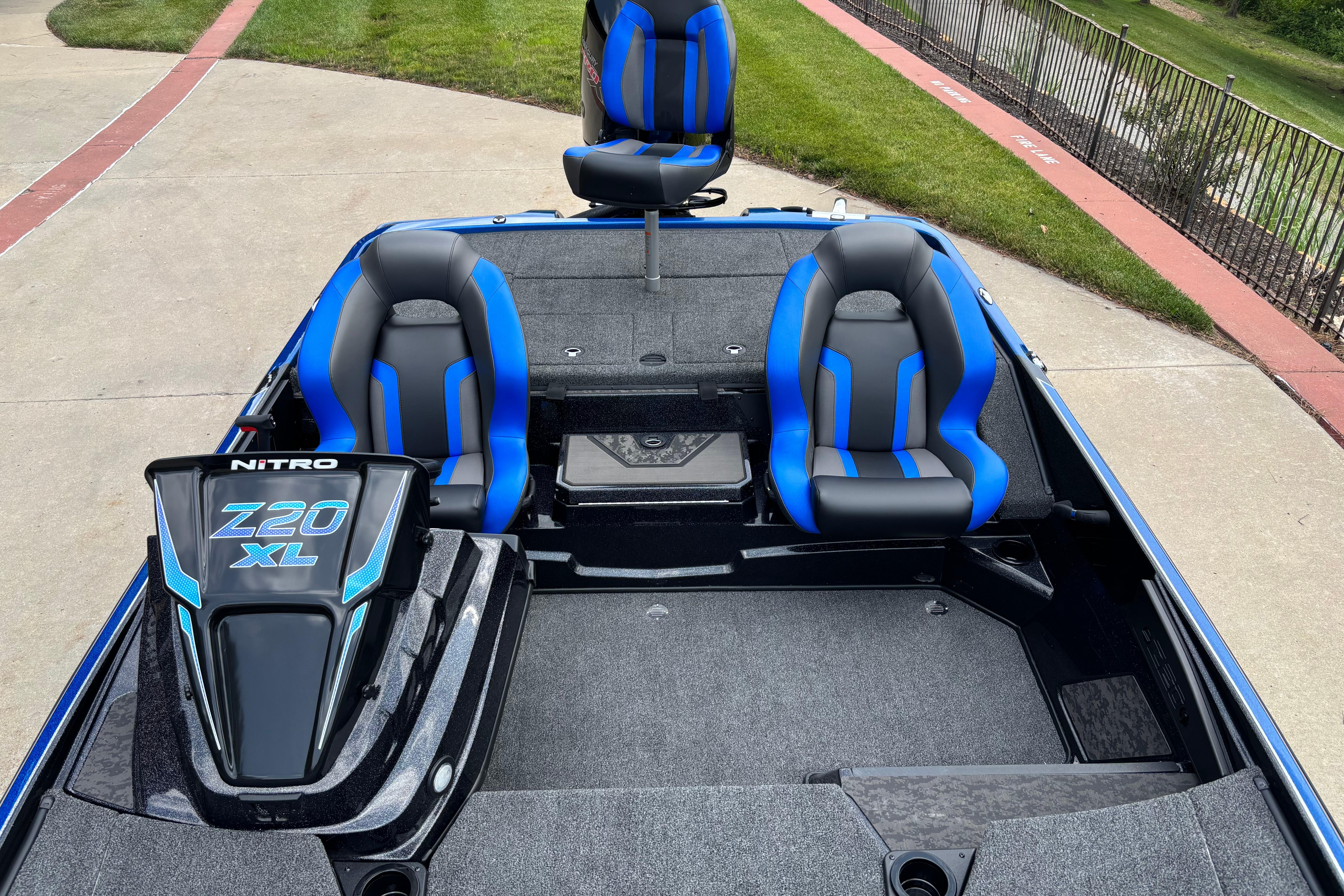 2026 Nitro Z20 XL Pro boat interior with blue and black seats, showcasing modern design.