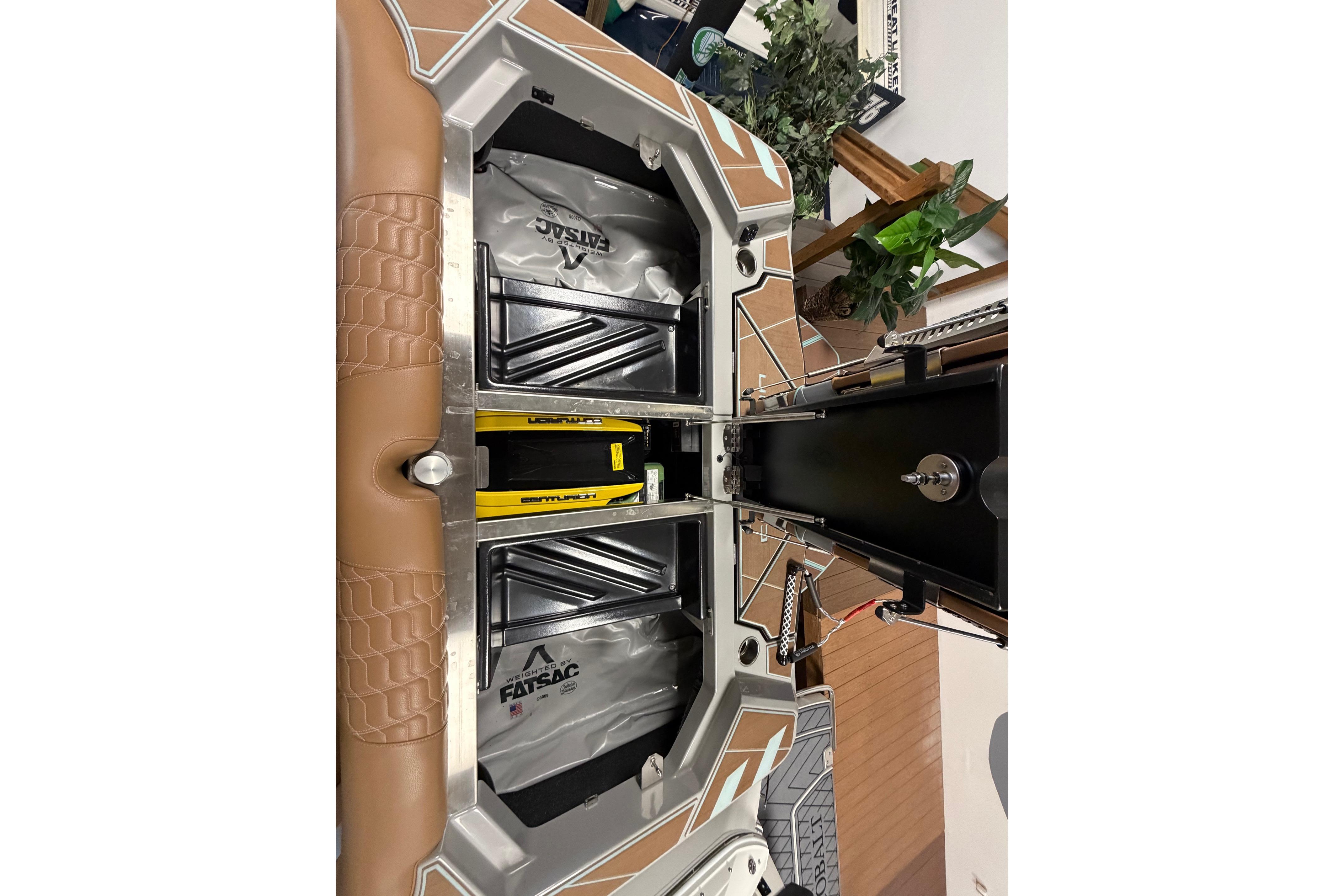2025 Centurion Ri245 boat interior storage compartments with FatSac ballast bags.