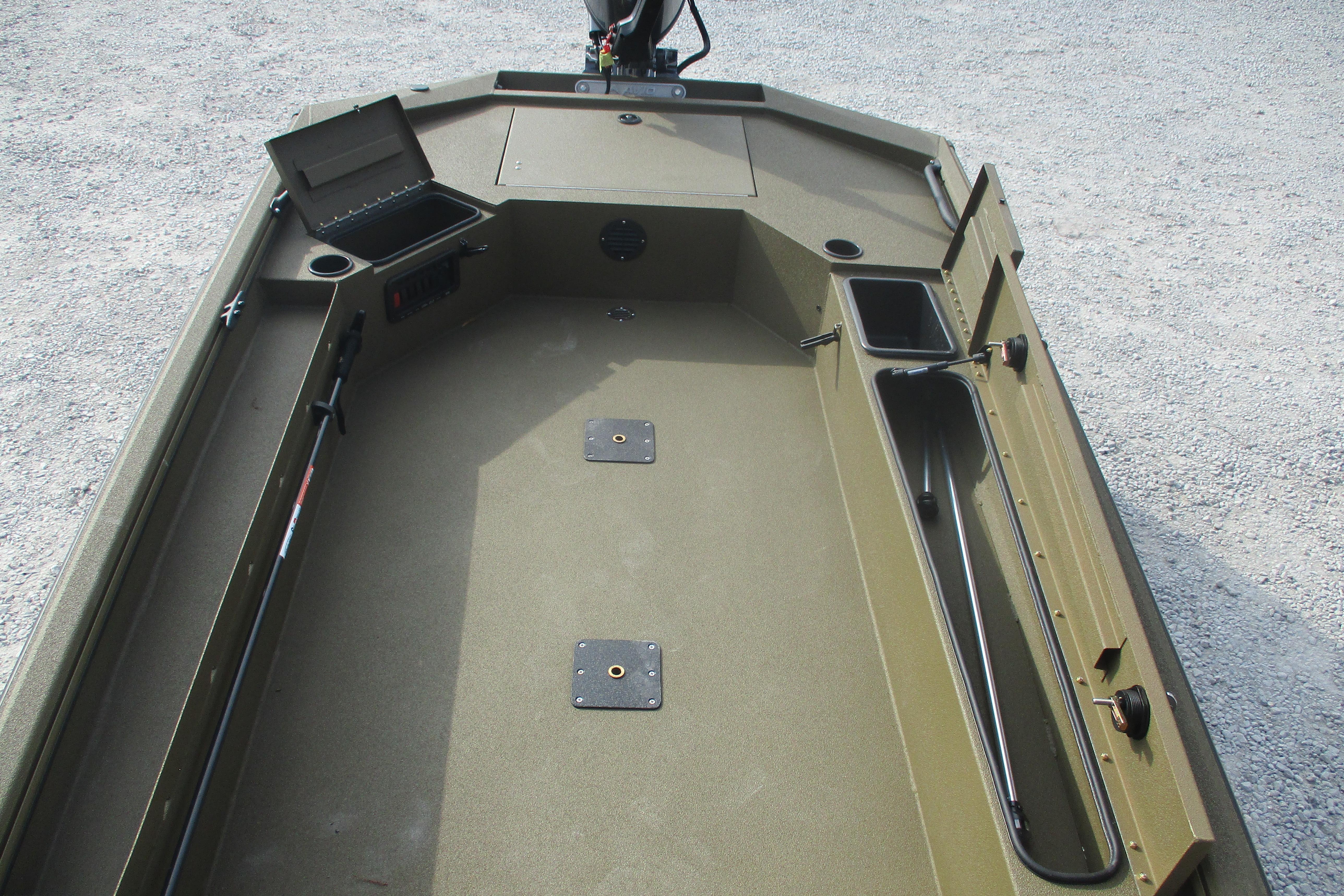2026 Avid 16 Commander boat interior with storage compartments and fishing rod holders.