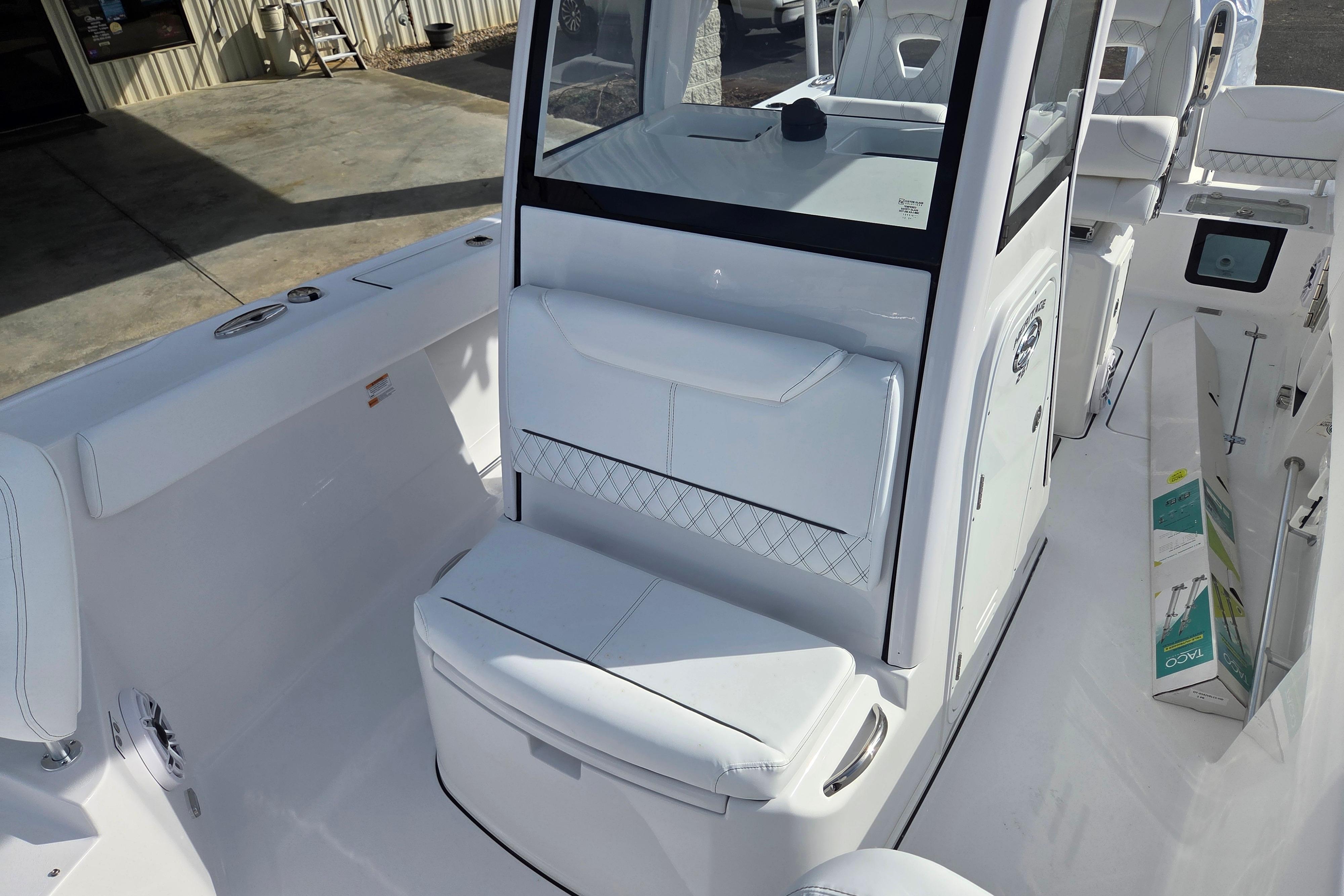 2026 Sportsman Heritage 261 Center Console boat interior with white seating and modern design.