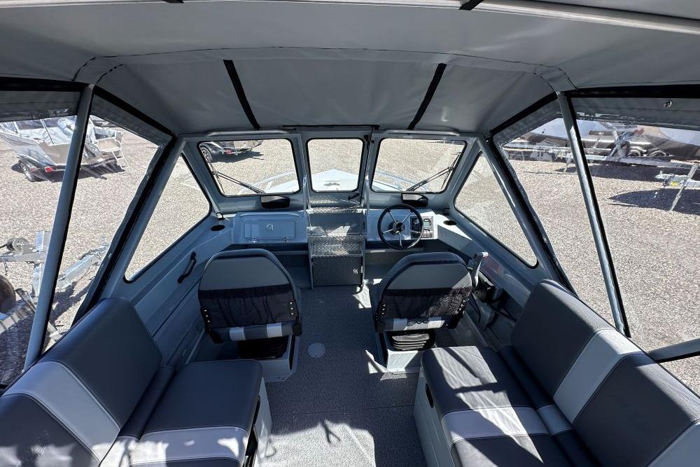 Interior of 2026 Hewescraft 200 ProV ET boat, featuring seating and steering console.