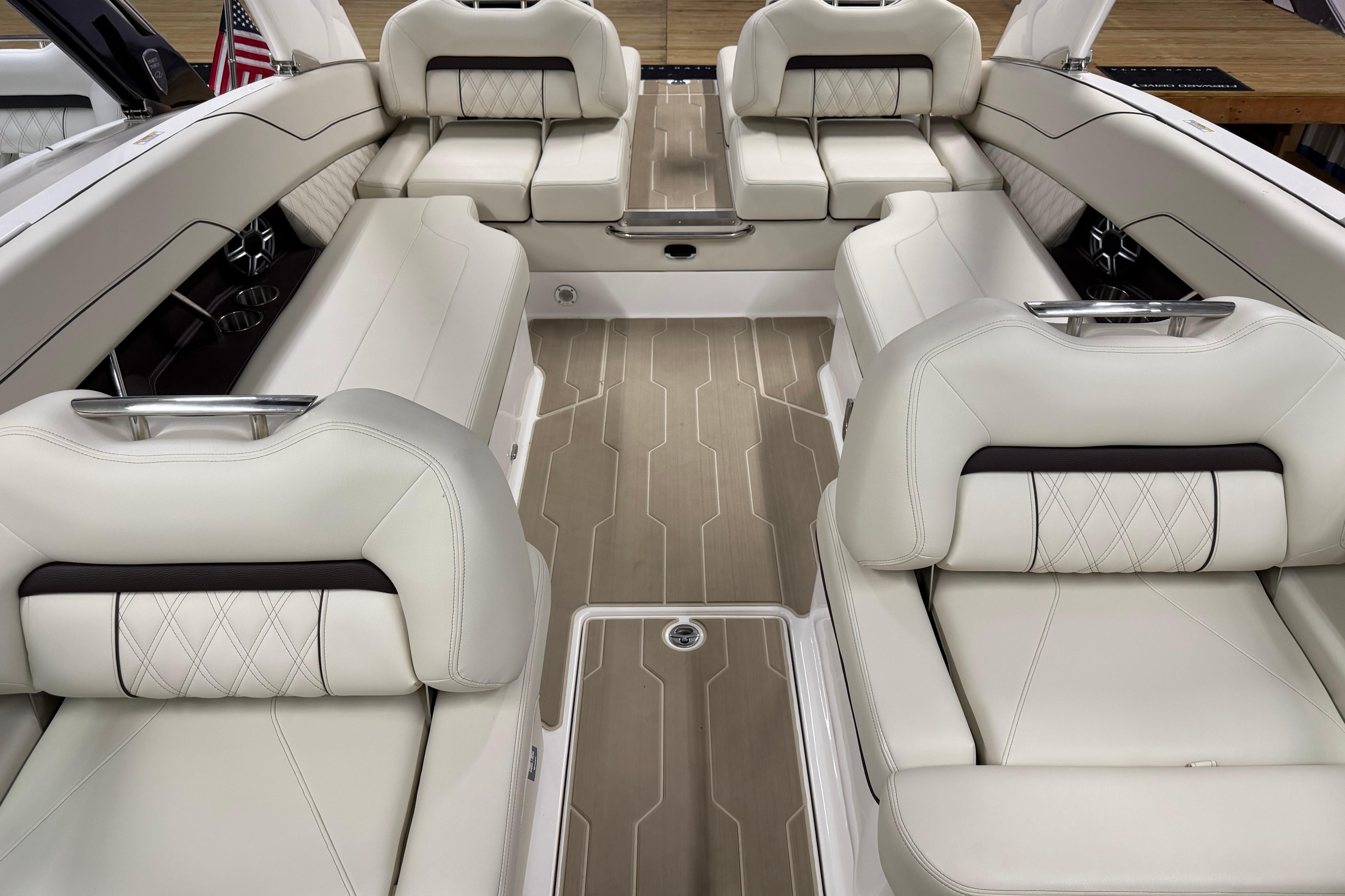 Luxurious interior of 2026 Regal LS6 boat with elegant white seating and modern design.