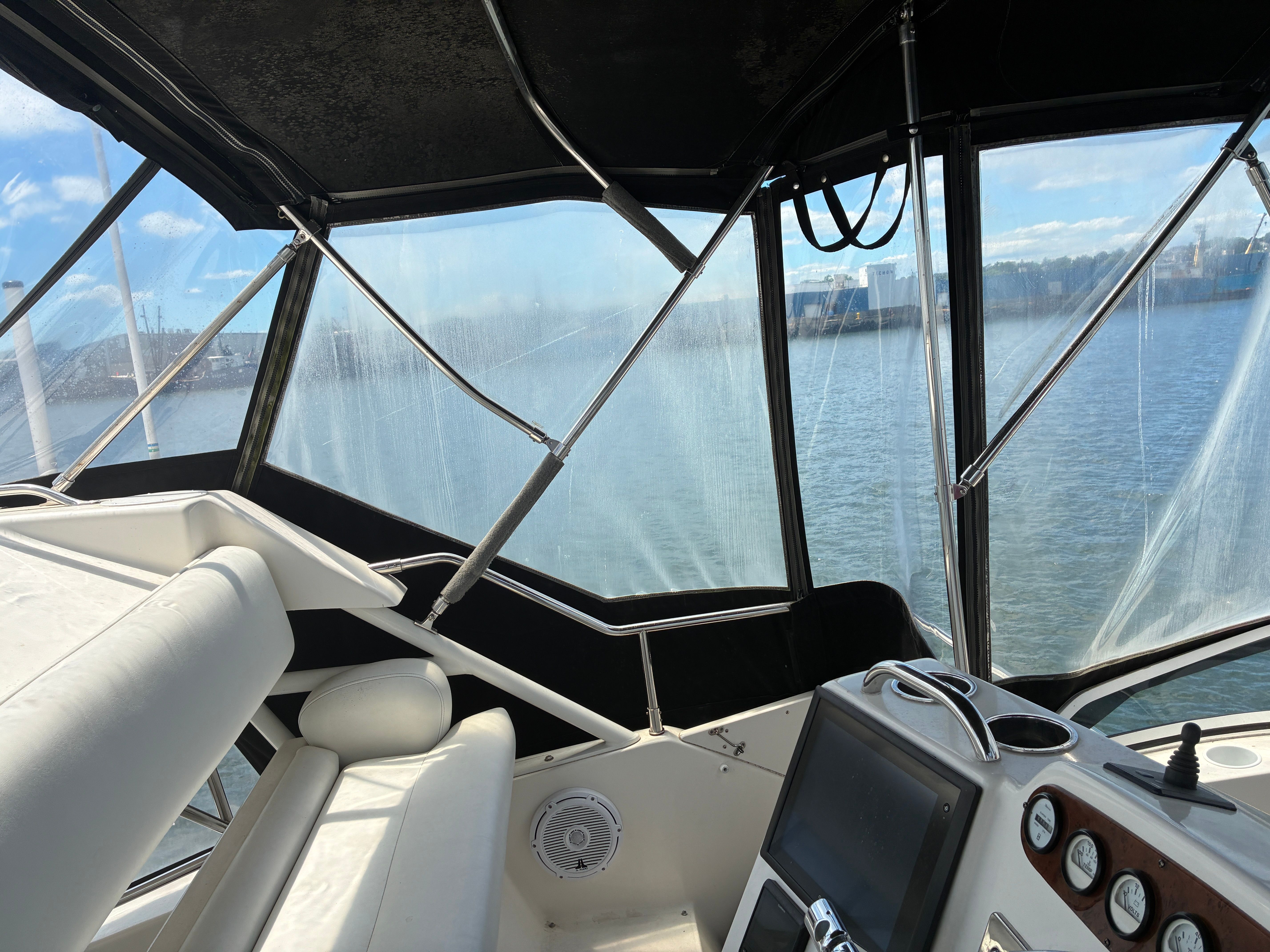 Interior view of a 2001 Silverton 392 Motor Yacht overlooking the water.
