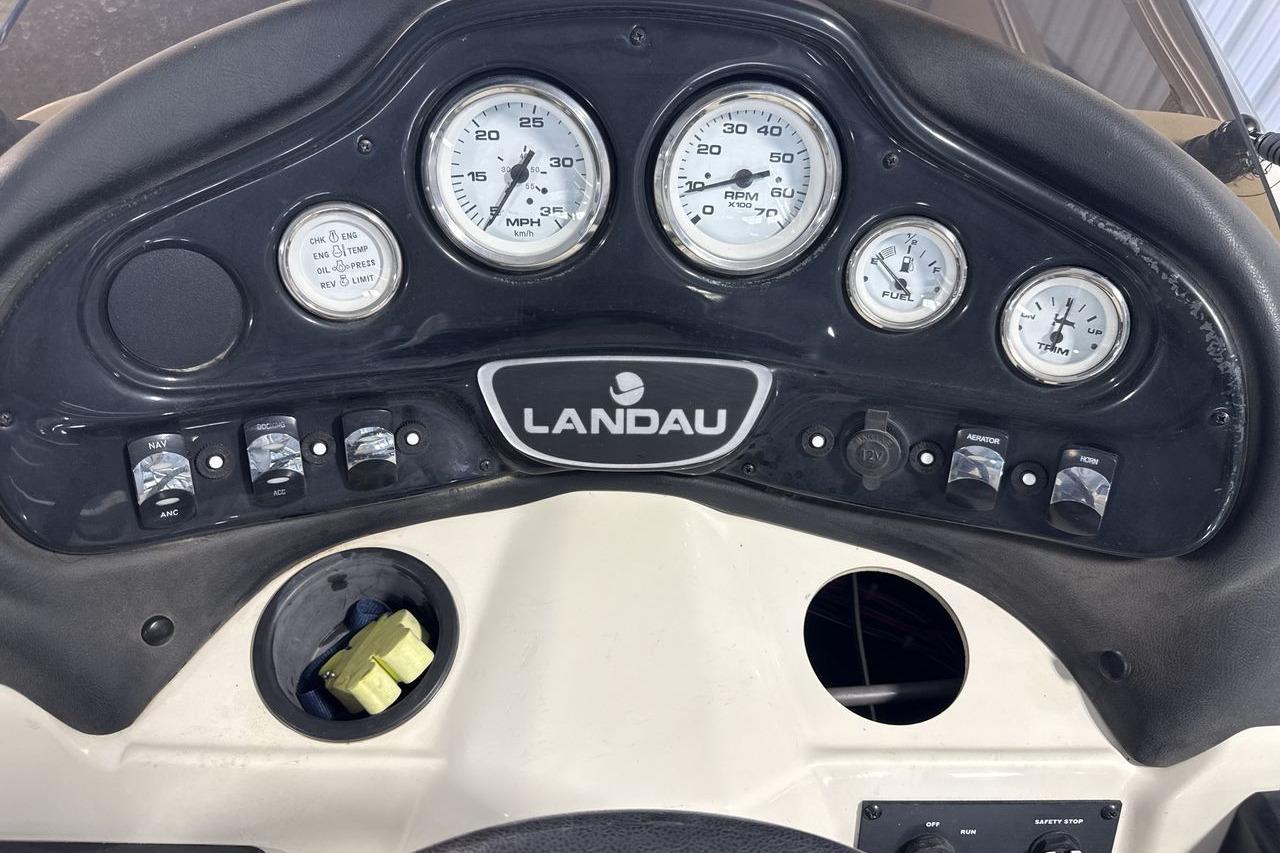Dashboard of a 2018 Landau Alure 212 Fish boat with gauges and controls.