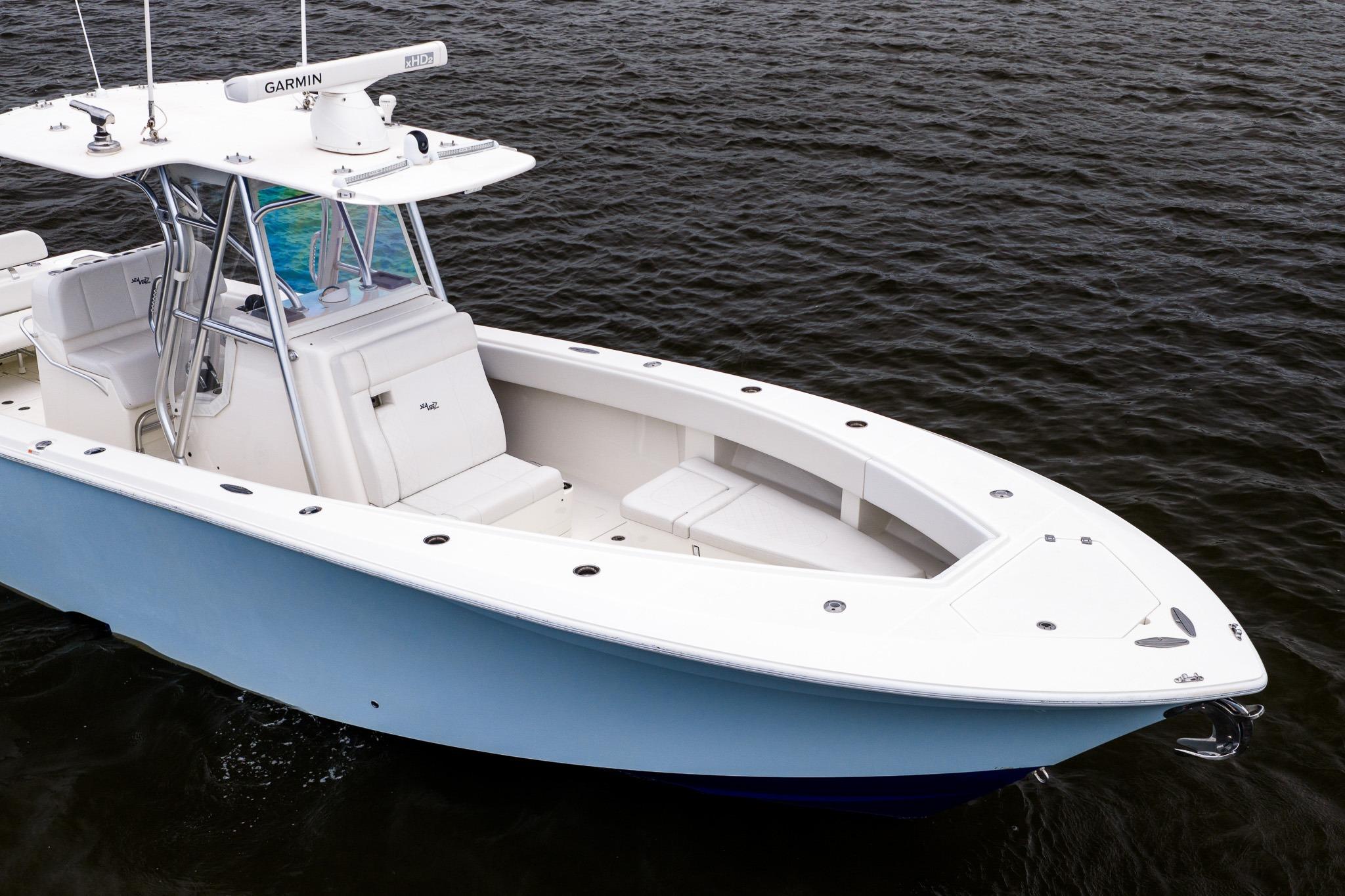 2019 SeaVee 322Z boat on water, featuring sleek design and advanced navigation equipment.