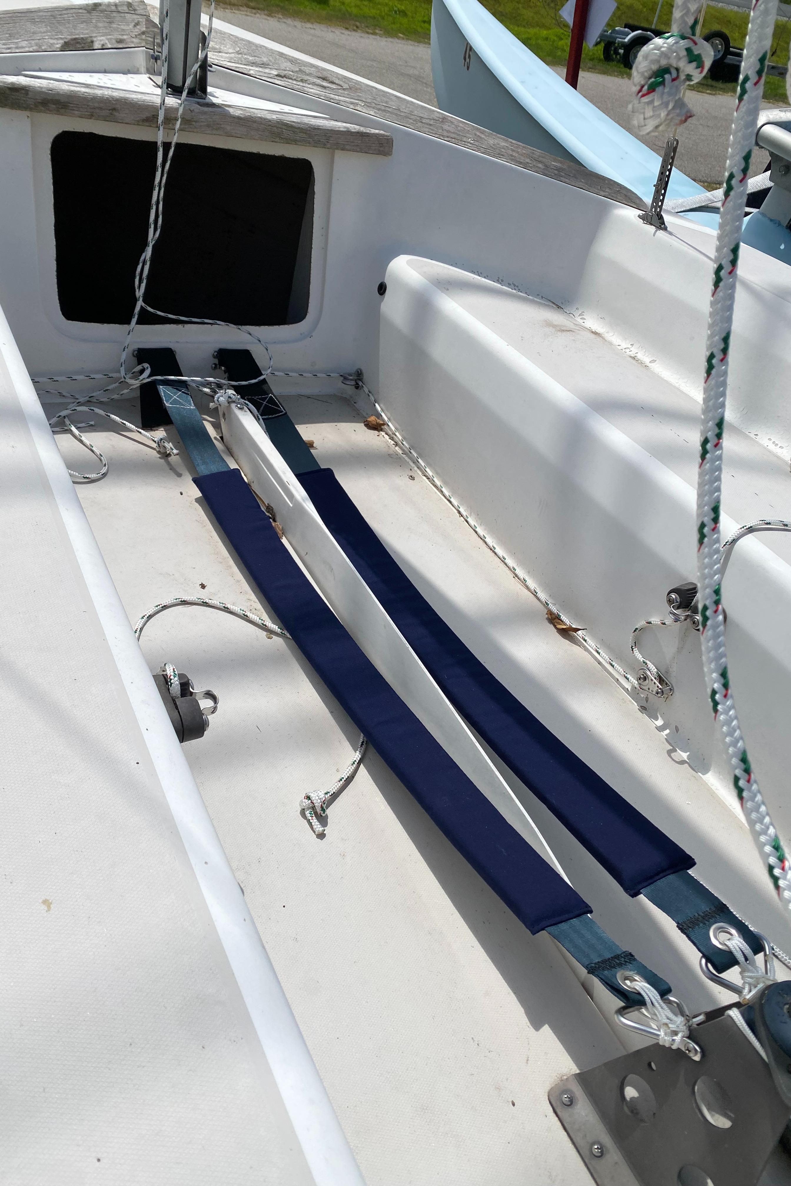 Interior of a 1986 Catalina CAPRI 14.2 sailboat showing seating and rigging.