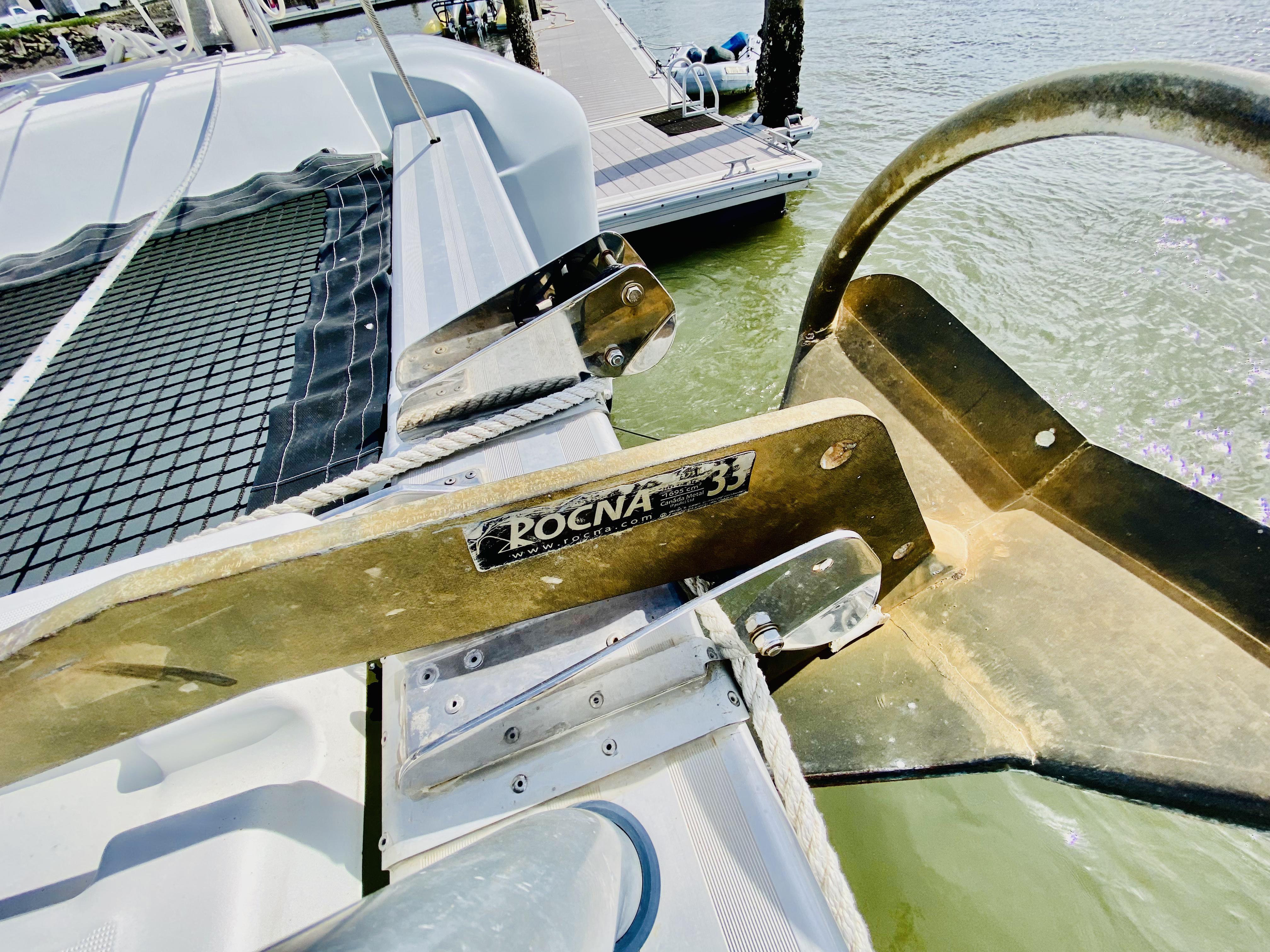 2019 Lagoon 42 Owners Version catamaran with Rocna 33 anchor at dock.
