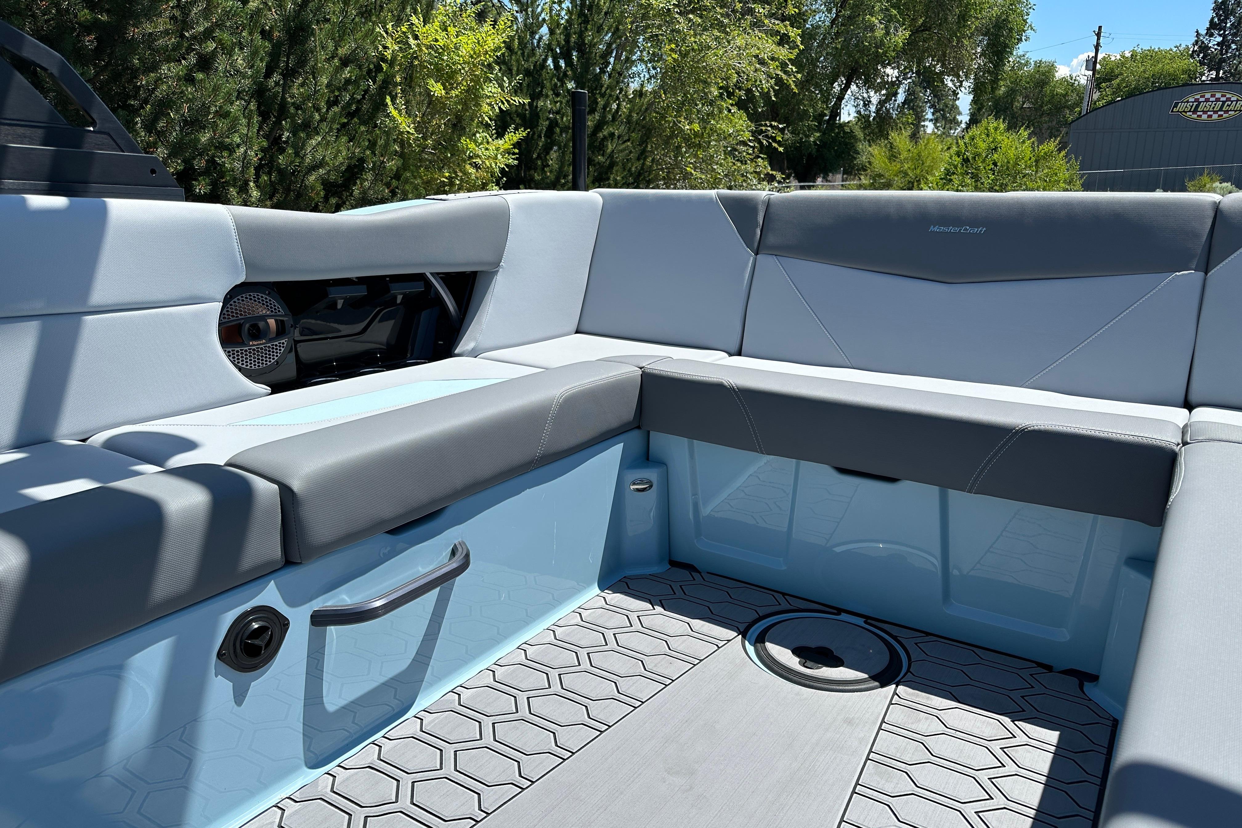 2023 MasterCraft NXT23 boat interior with gray seating and modern design.