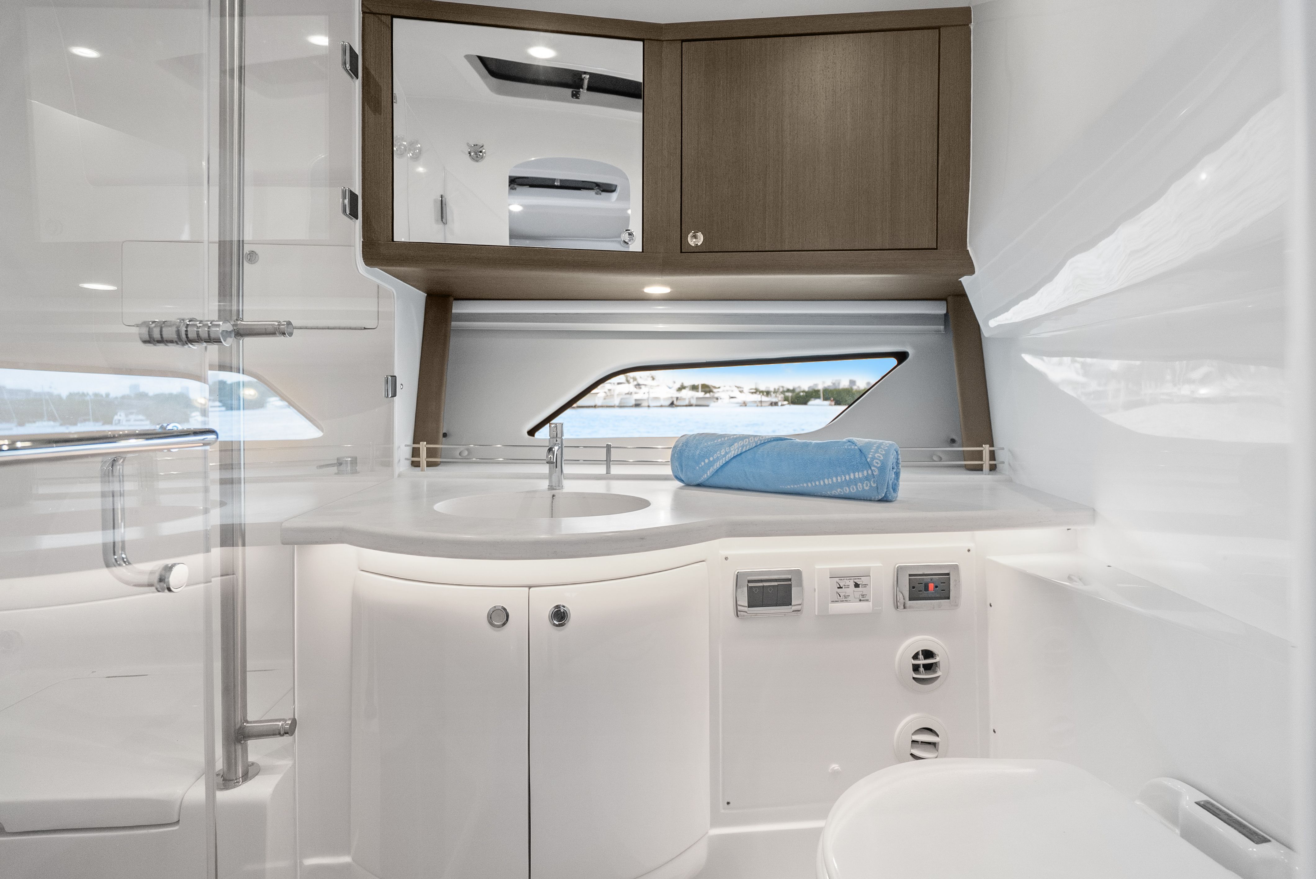 Luxurious bathroom of the 2024 Intrepid 477 Evolution yacht.