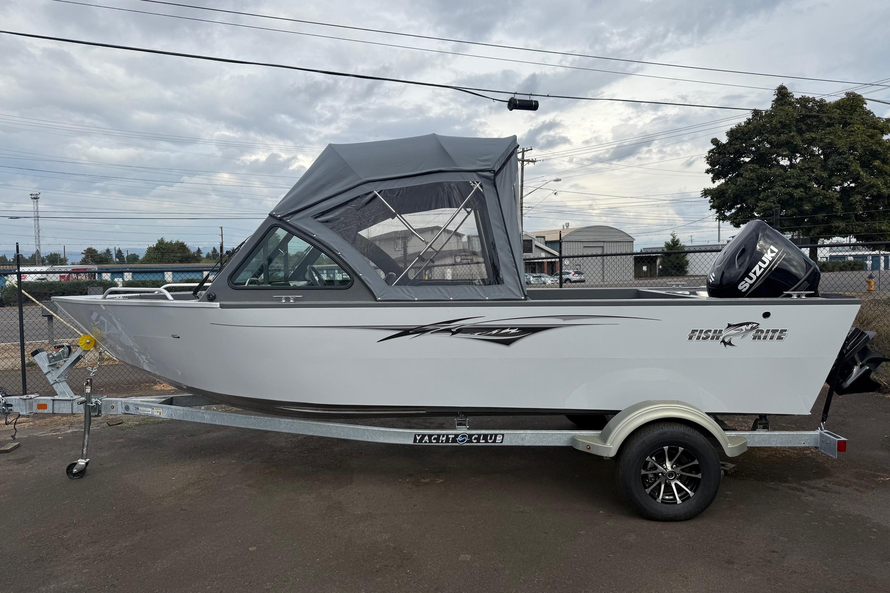 2026 Fish Rite Sportsman 20 boat on trailer with Suzuki outboard motor.