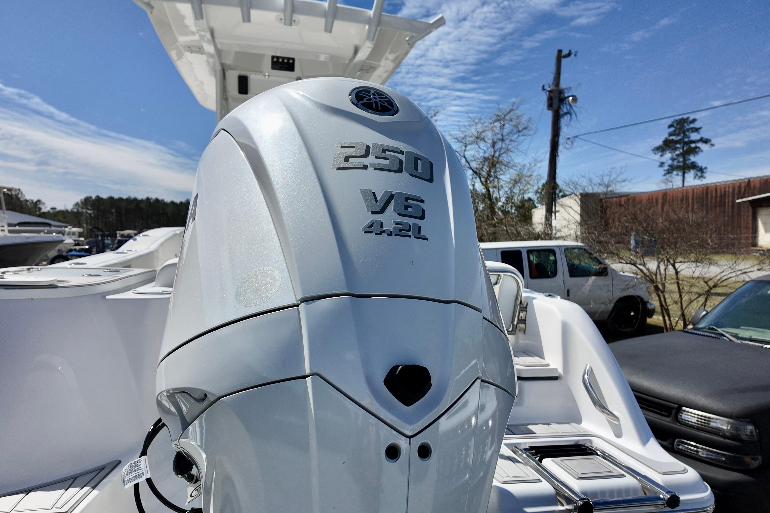 2026 Sea Fox 248 Commander with Yamaha 250 V6 outboard engine, parked outdoors.