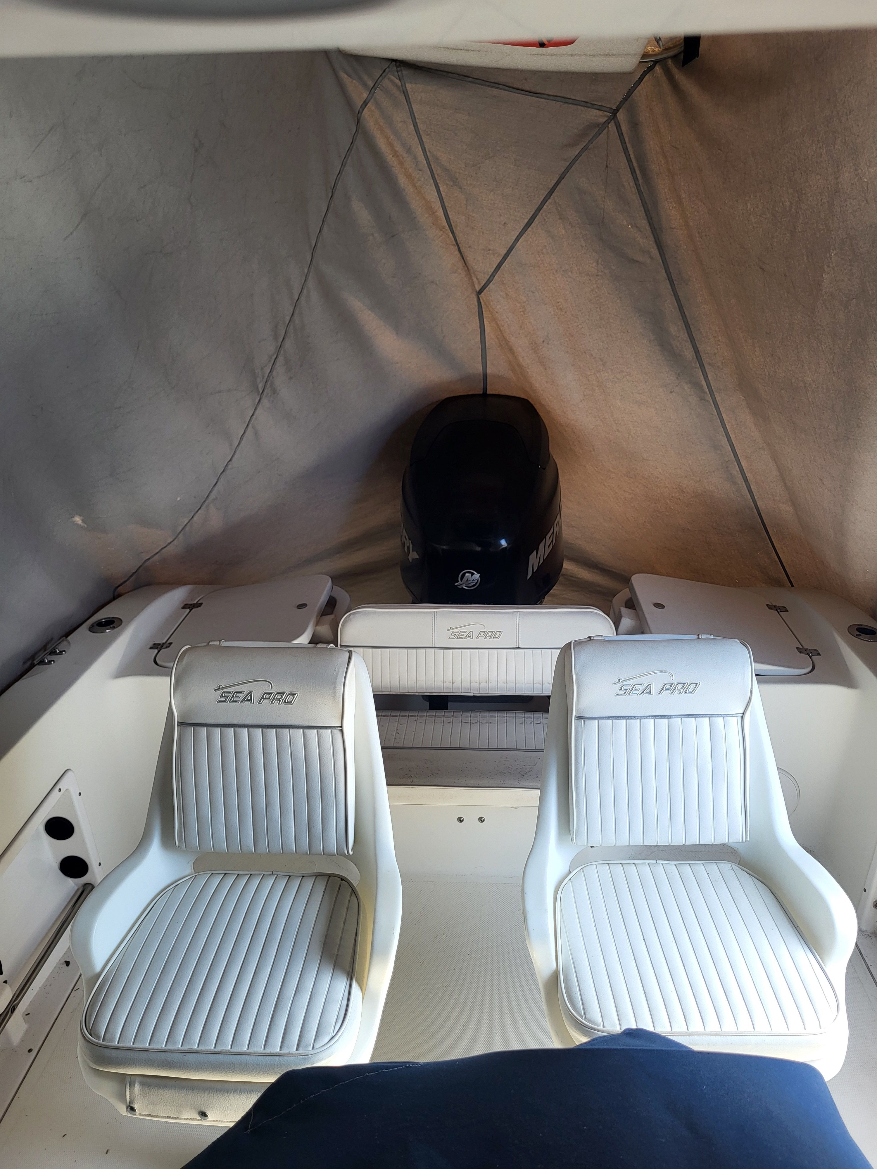 Interior view of a 2008 Seapro Center Console boat with two seats.