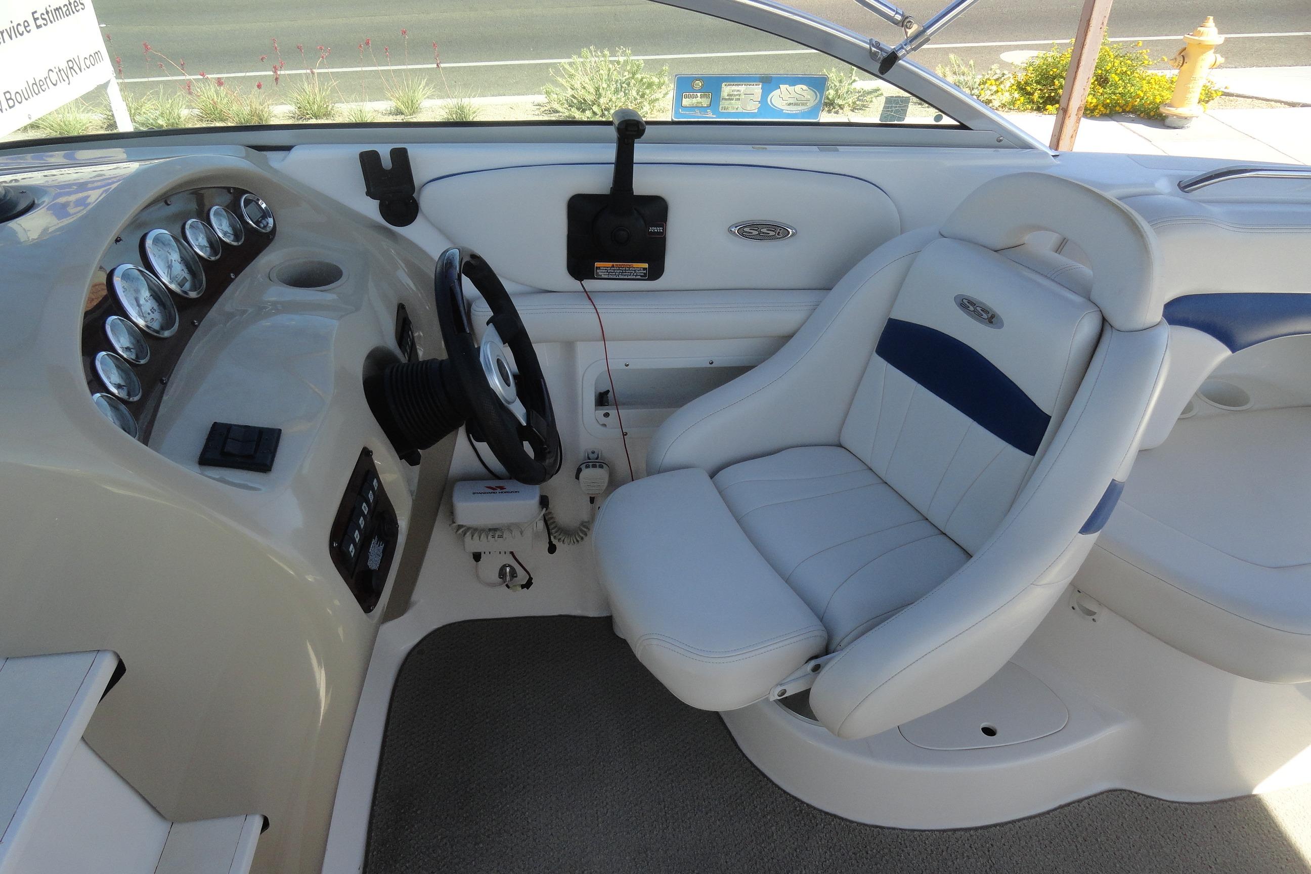 2001 Chaparral 265 SSi boat interior with steering wheel and dashboard controls.