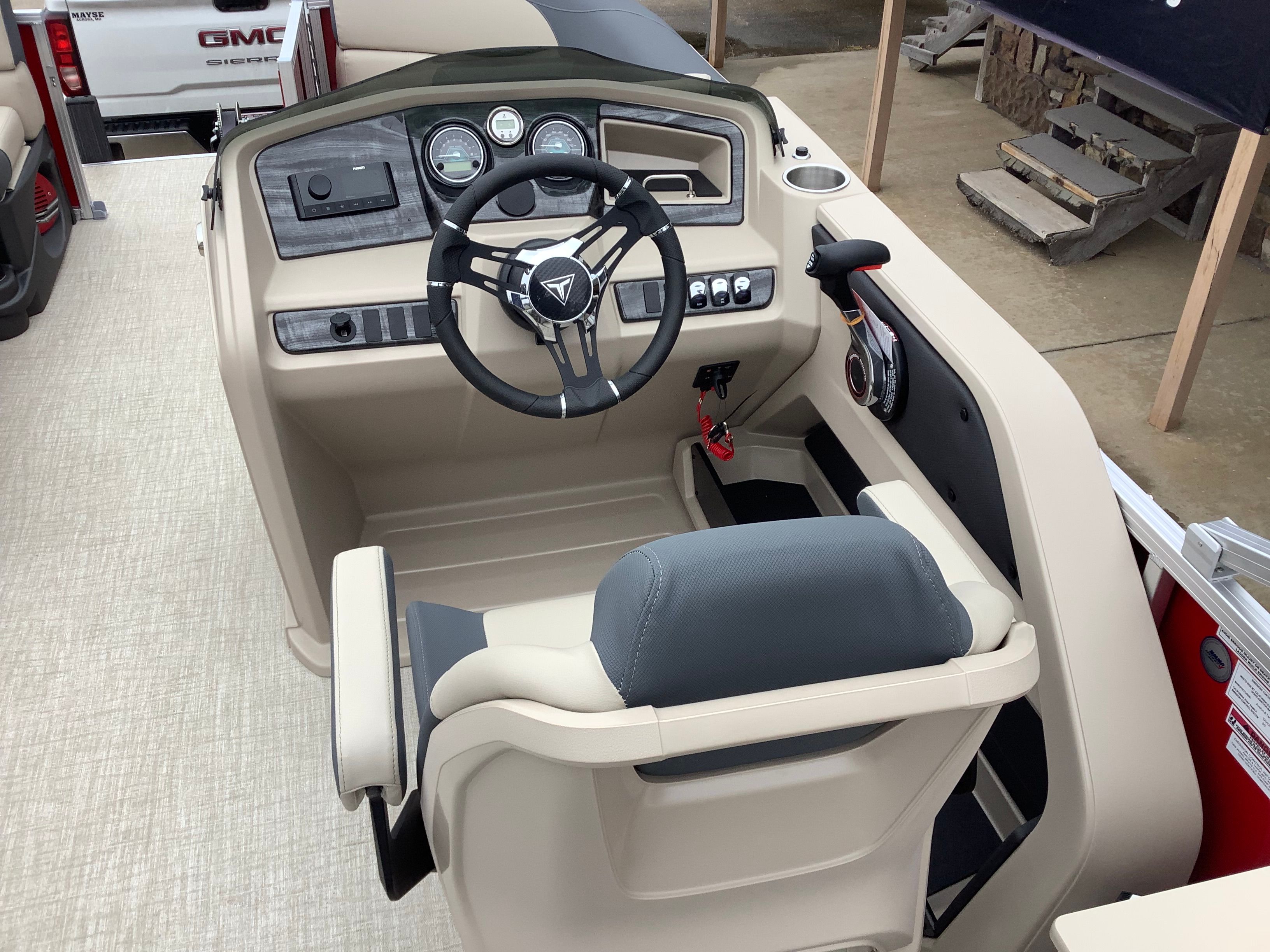 Interior of 2026 Tahoe 2185 LTZ boat with steering console.