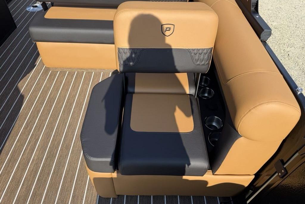 Luxurious seating on 2026 Premier 250 Solaris RS CL boat with tan and black upholstery.