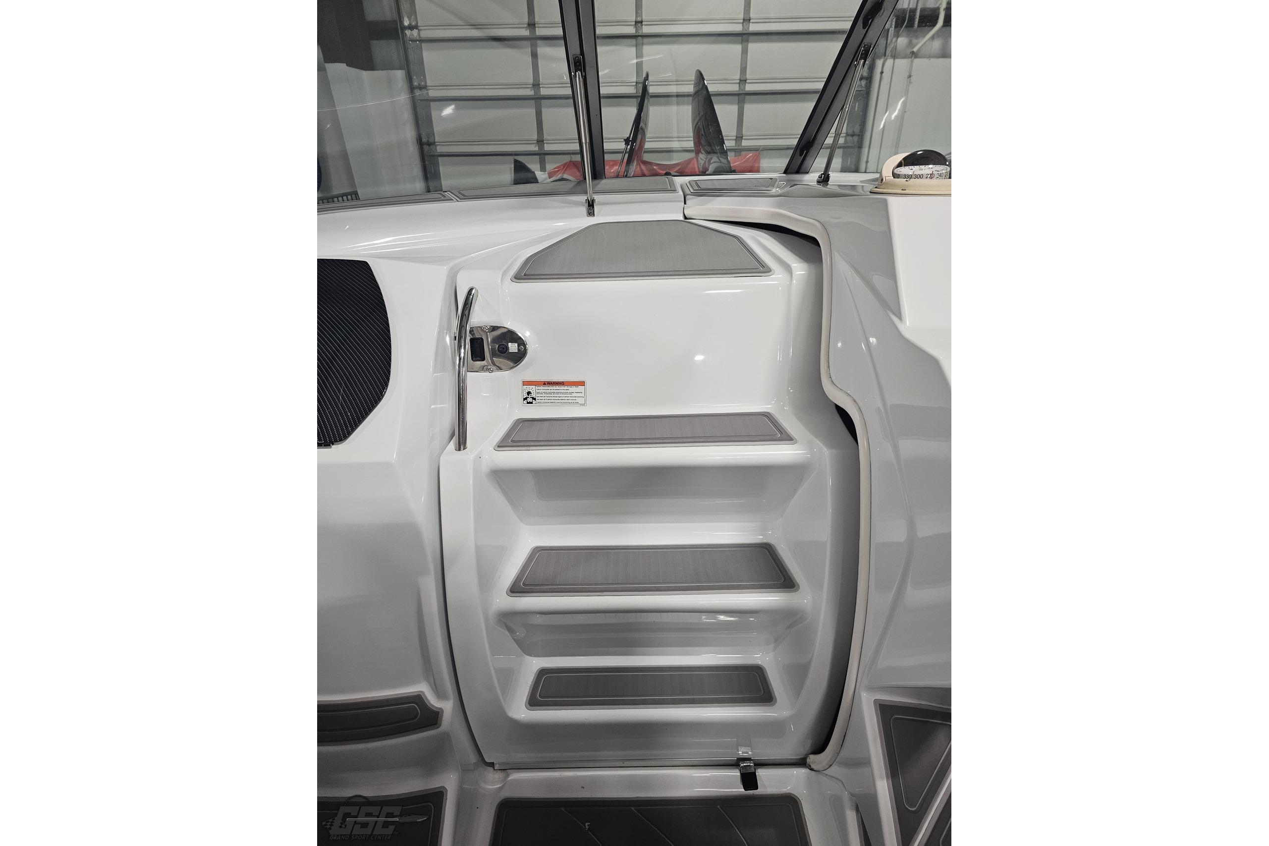 2008 Baja 335 Performance boat interior door with sleek design and modern detailing.