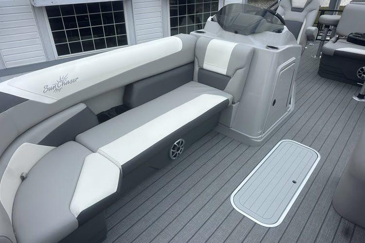 2026 SunChaser Eclipse 25 SBX DH BAR boat interior with gray seating and modern design.