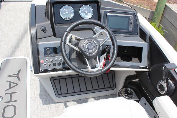 2025 Tahoe Pontoon Cascade Quad Lounger dashboard with steering wheel and control panel.