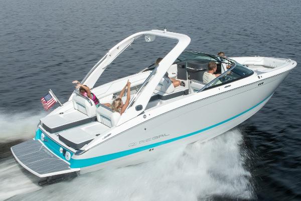 Manufacturer Provided Image: 2026 Regal LS6 boat cruising on water with passengers enjoying the ride.
