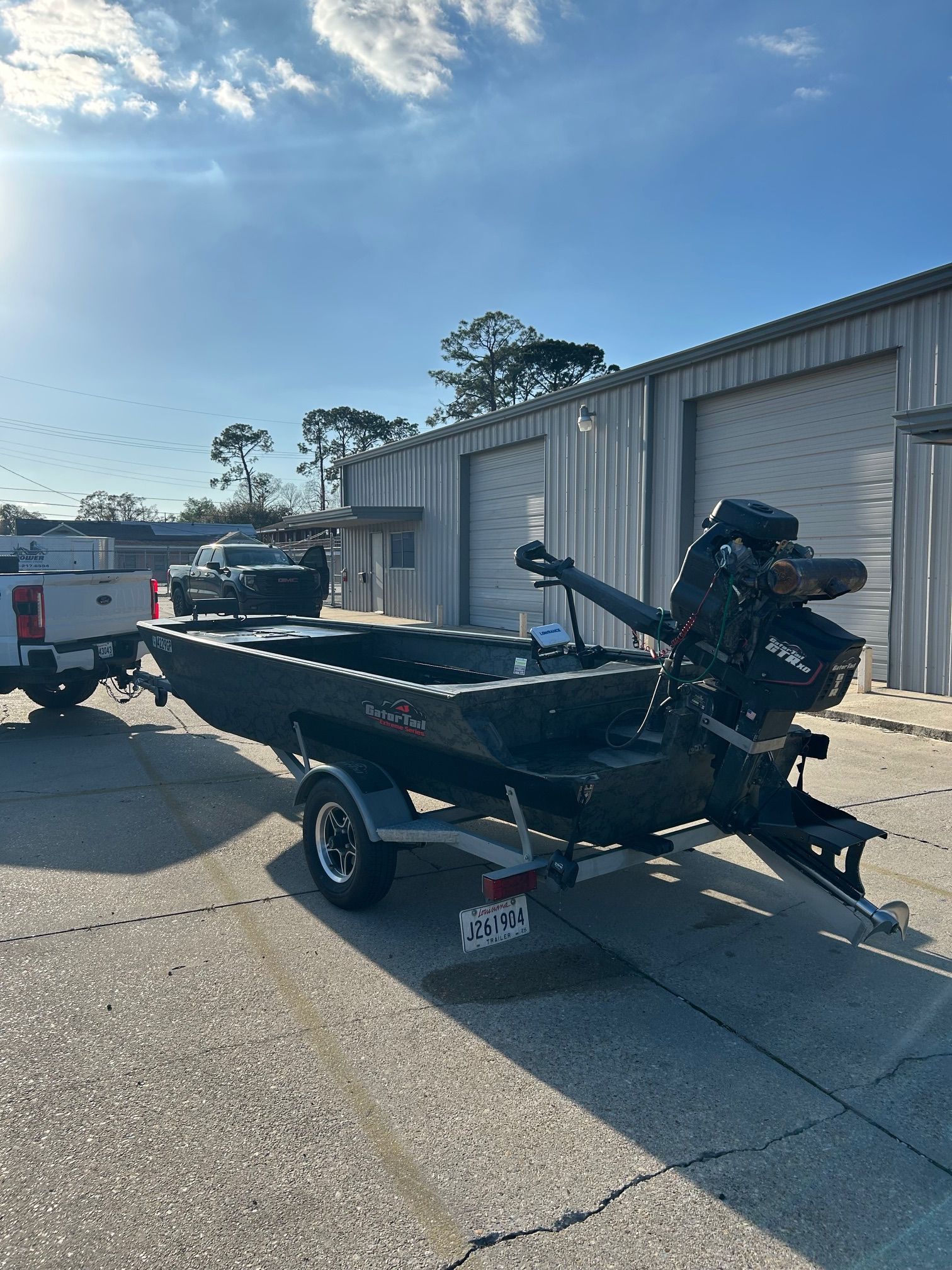 2024 GATOR-TAIL 18x54 Extreme boat on trailer outdoors.