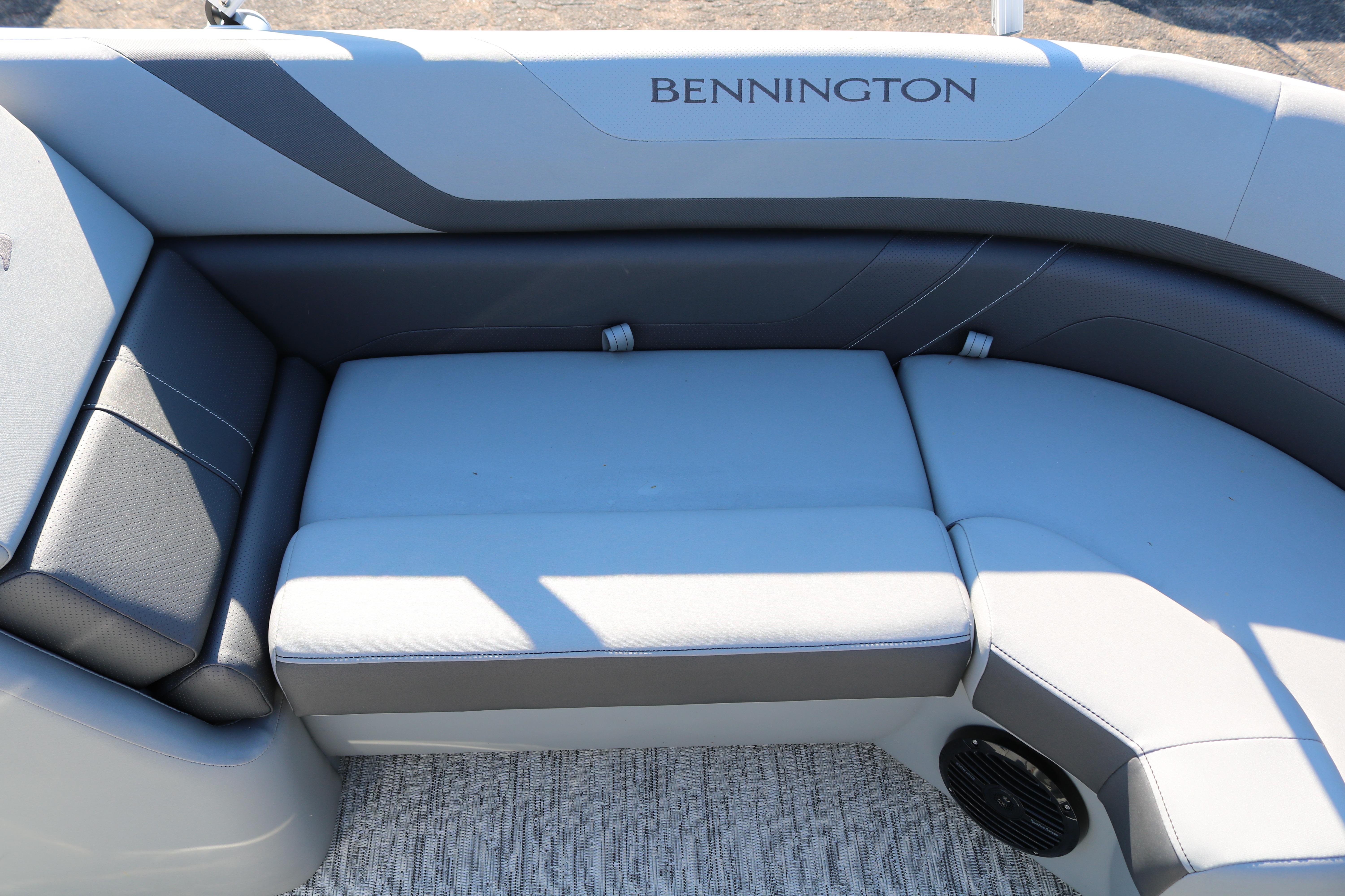 2026 Bennington 22SX Stern Radius boat interior with gray cushioned seating.