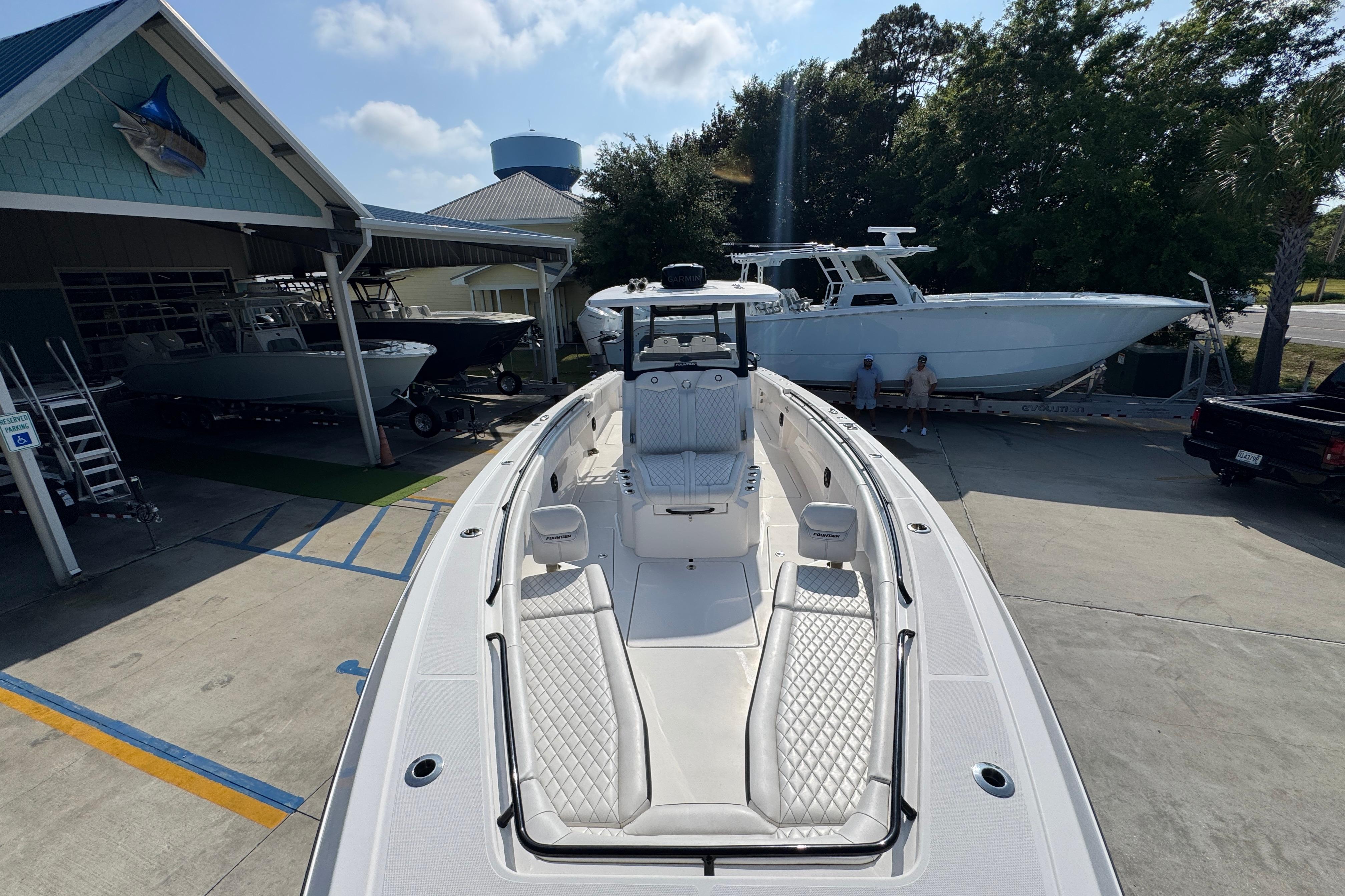 2024 Fountain Bluewater 38 Tournament Edition boat displayed at a marina.