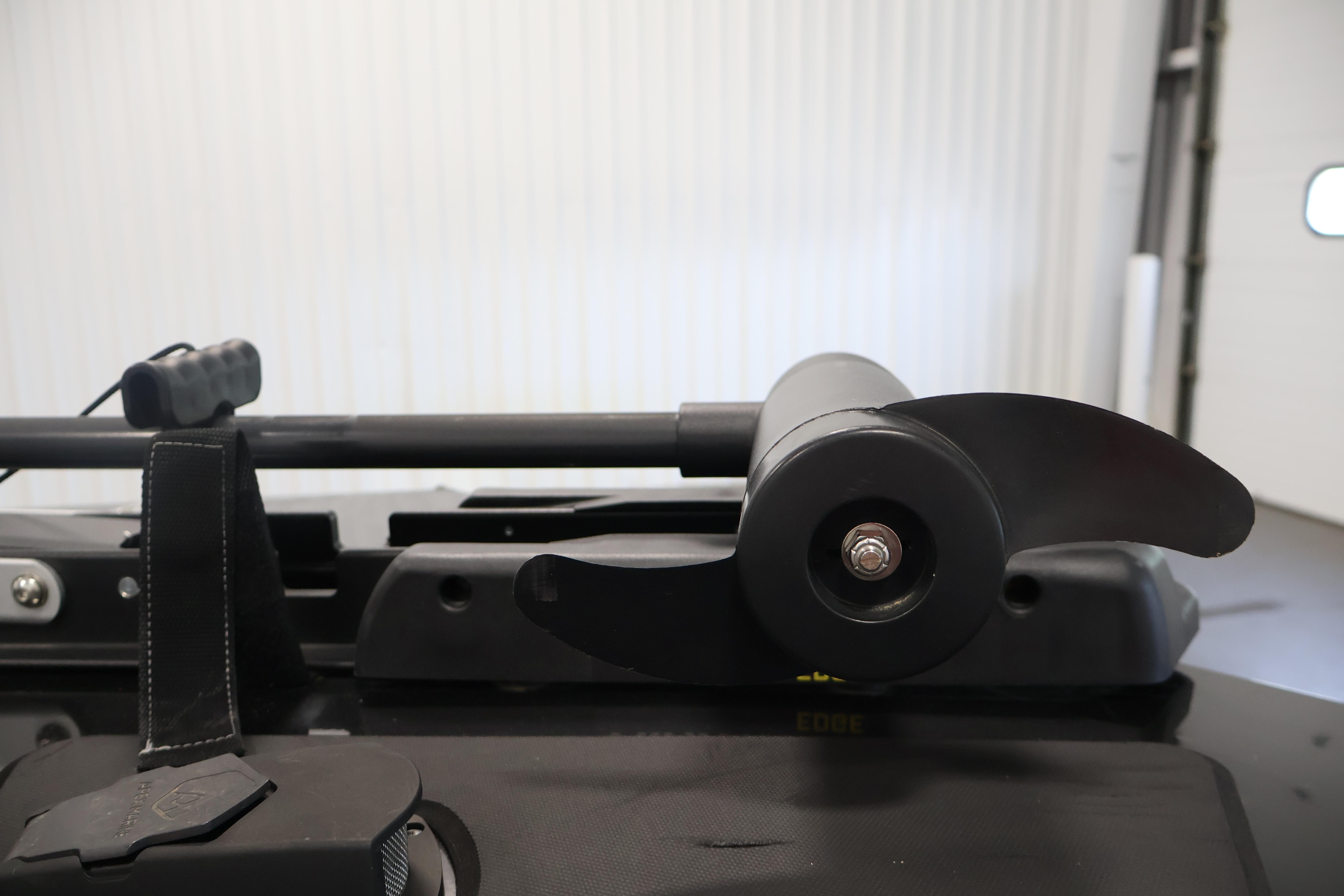 2024 Tracker Pro 170 boat motor detail in a garage setting.
