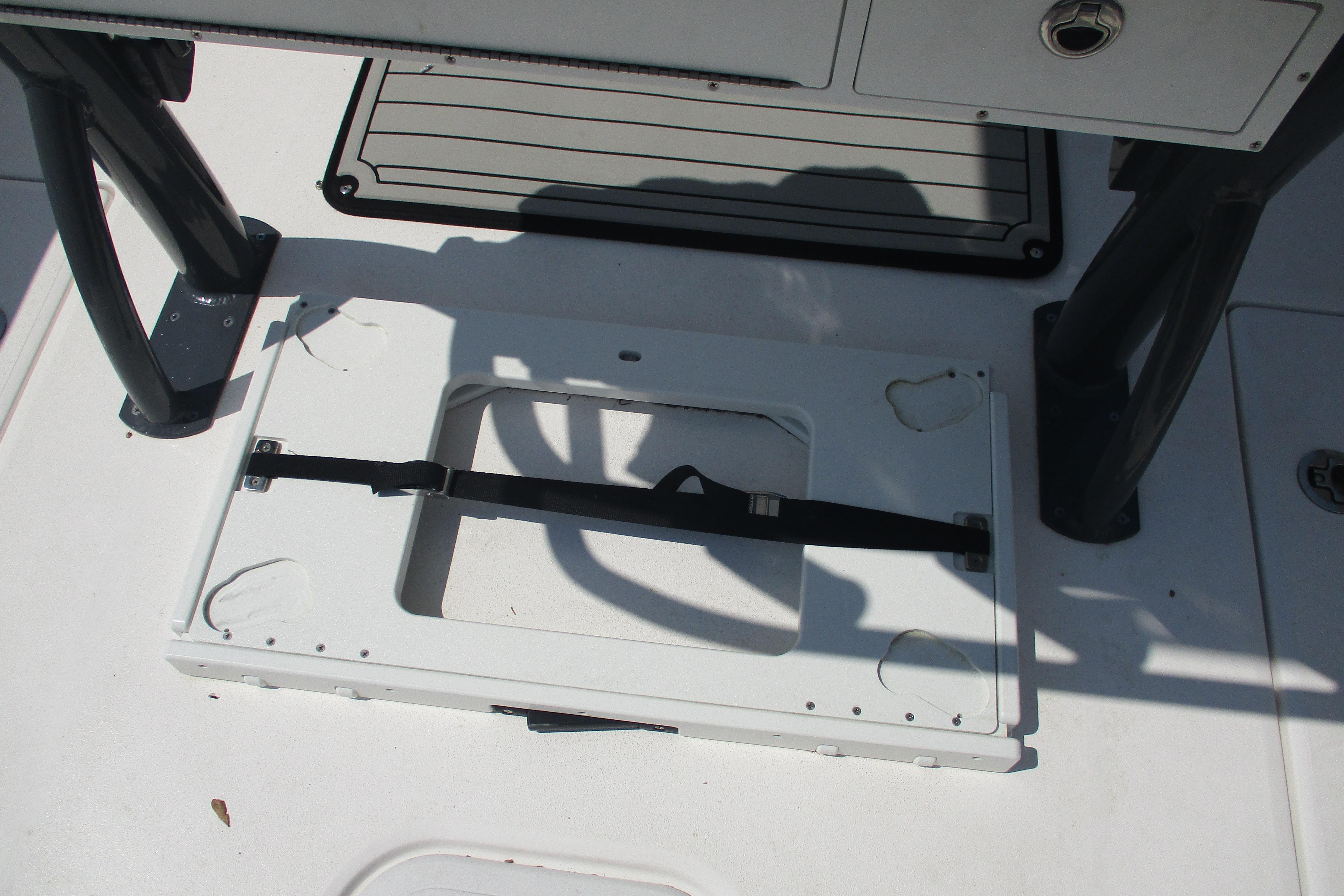 2024 Sea Fox 268 Commander deck detail with storage compartment and strap.