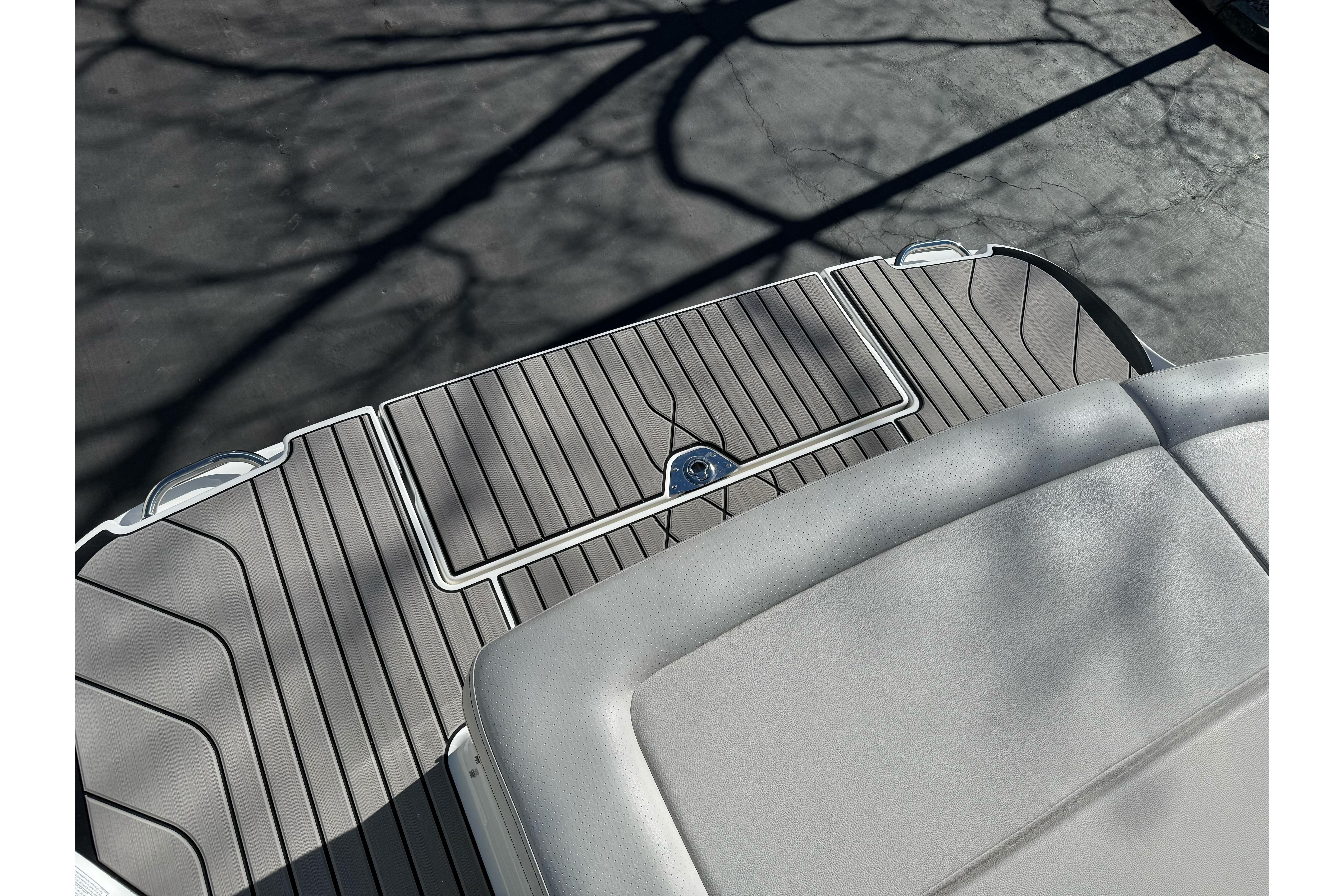 2026 Sea Ray SLX 260 boat deck with sleek, modern design and comfortable seating.