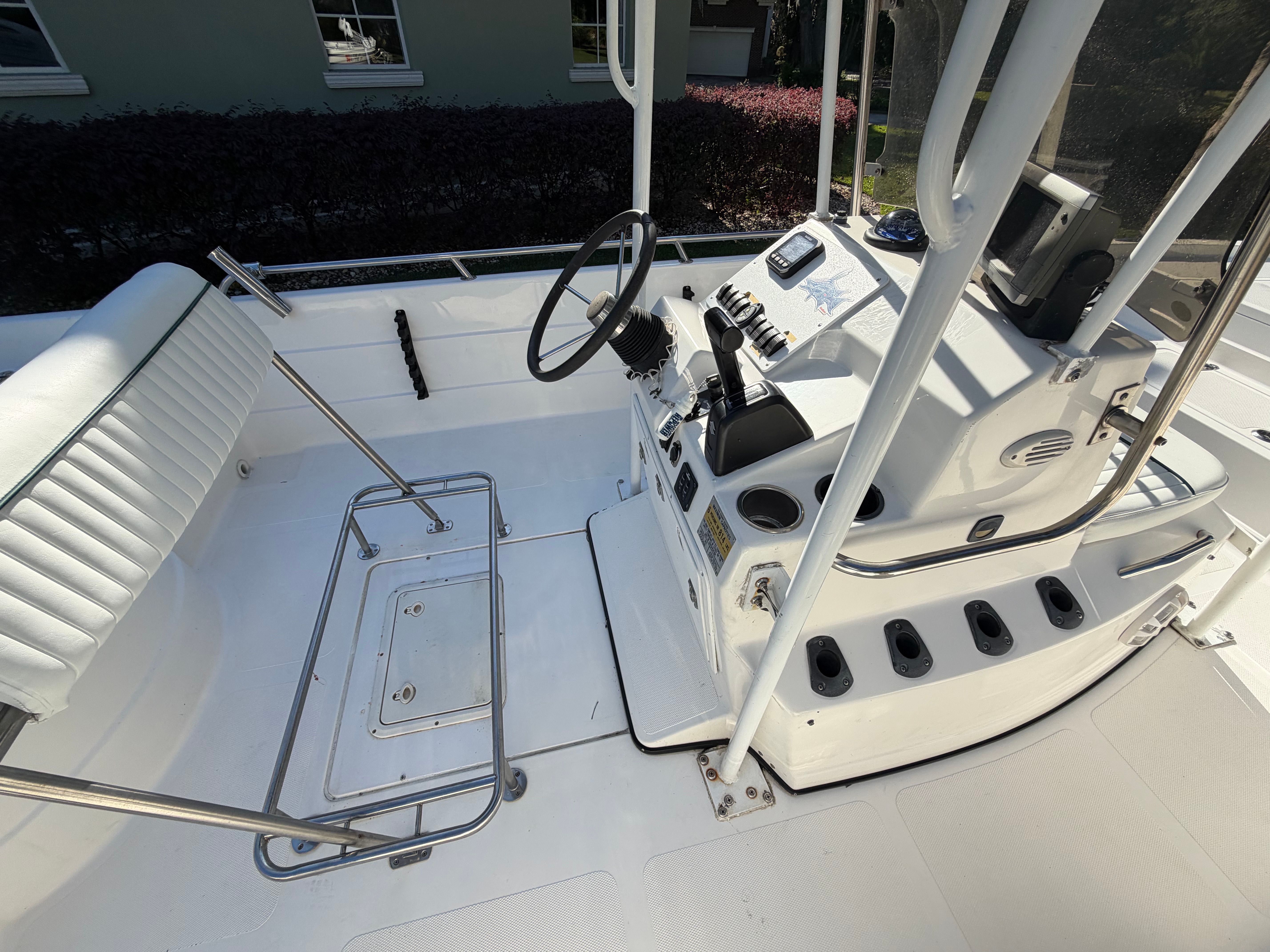 Interior view of a 1999 Skeeter ZX2200 boat with steering console.