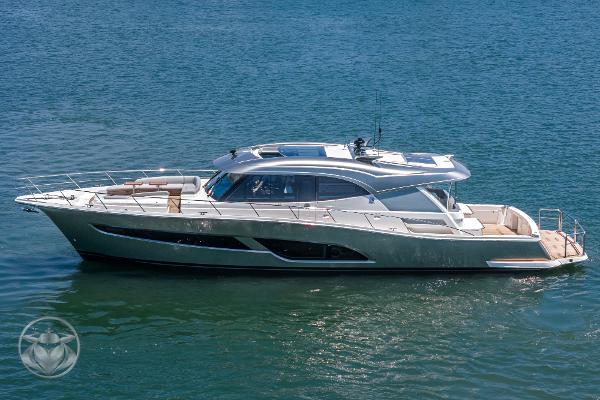 2025 Riviera 645 SUV luxury yacht cruising on the water.