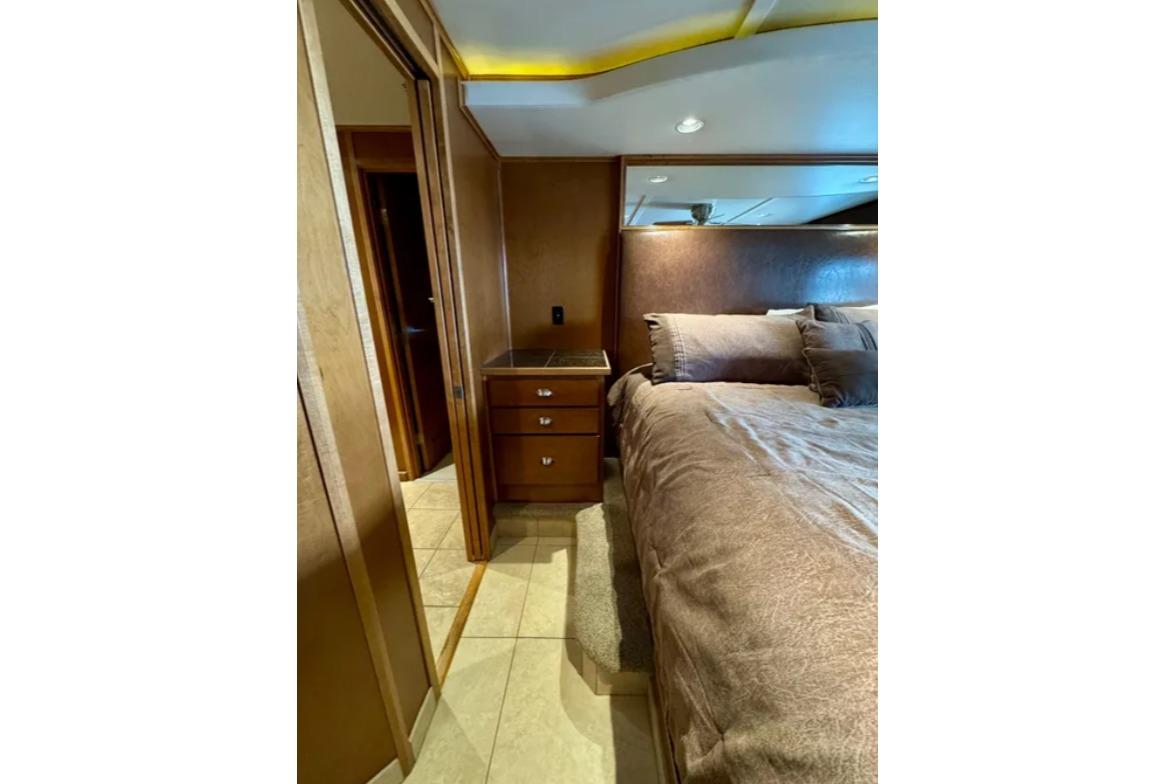 Luxurious bedroom interior in 2012 Bravada Helios Share #8 houseboat.