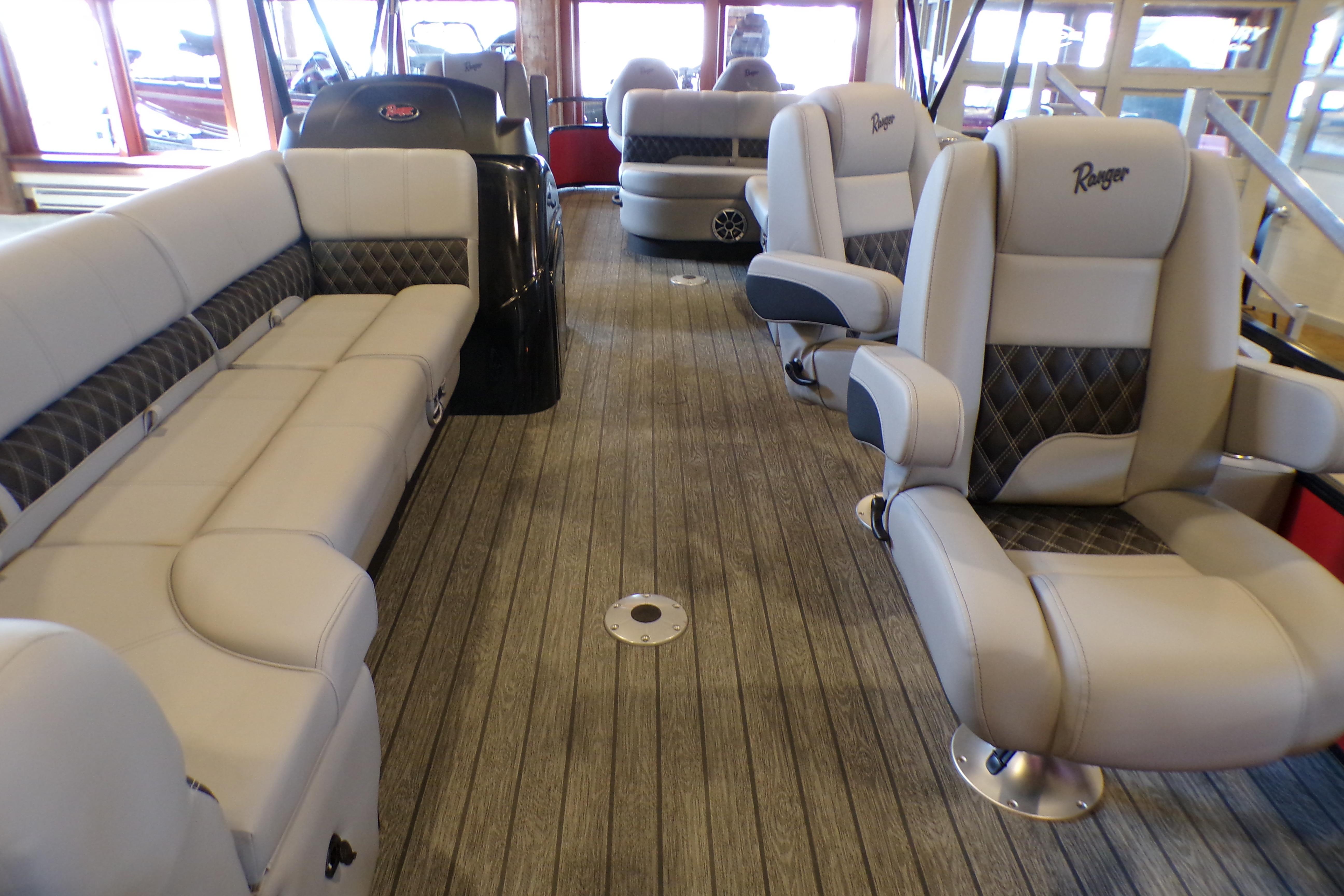 Interior of 2026 Ranger 220FC boat with luxurious seating and modern design.