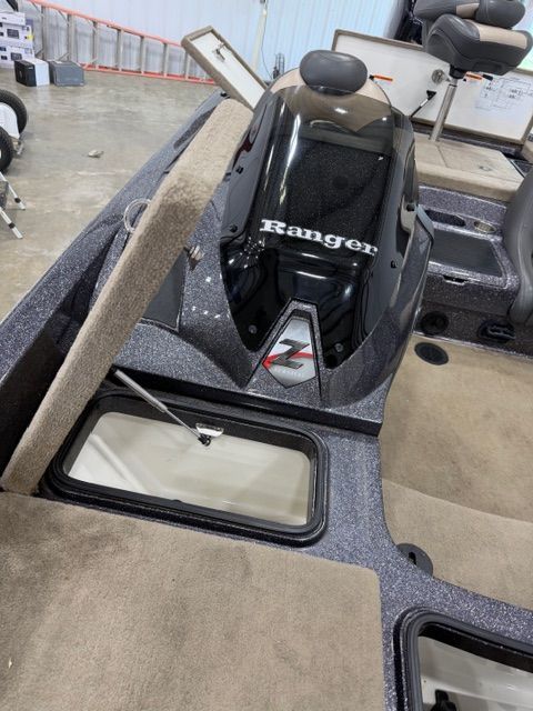 2011 Ranger Z520 Comanche boat interior with storage compartments.