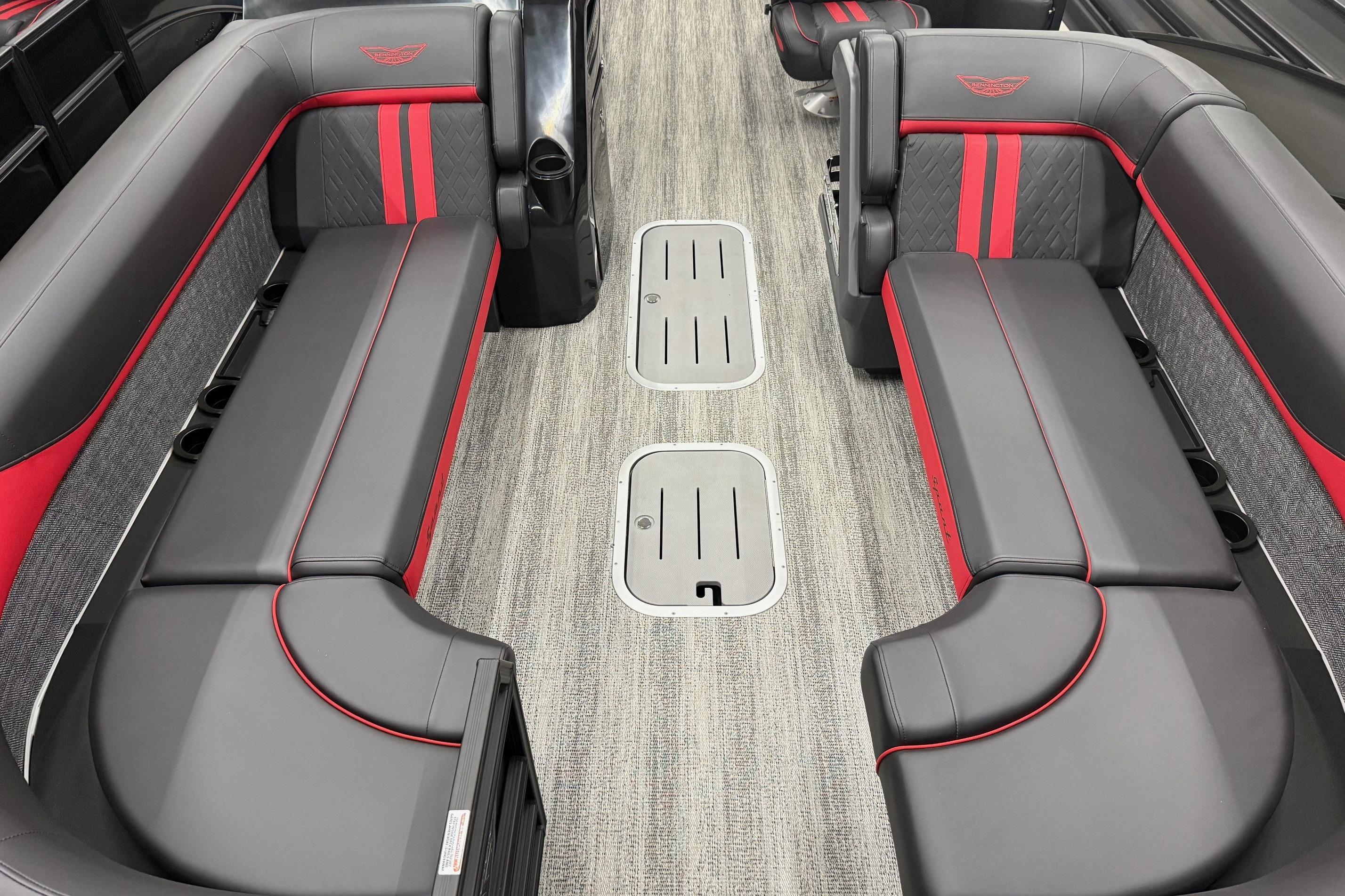 Luxurious interior of 2025 Bennington M Line boat with sleek seating and modern design.