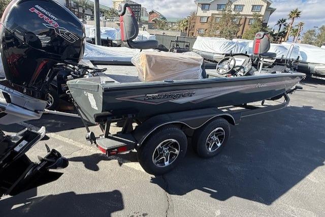 2026 Ranger RT198P boat on trailer, featuring Mercury Pro XS engine, parked outdoors.