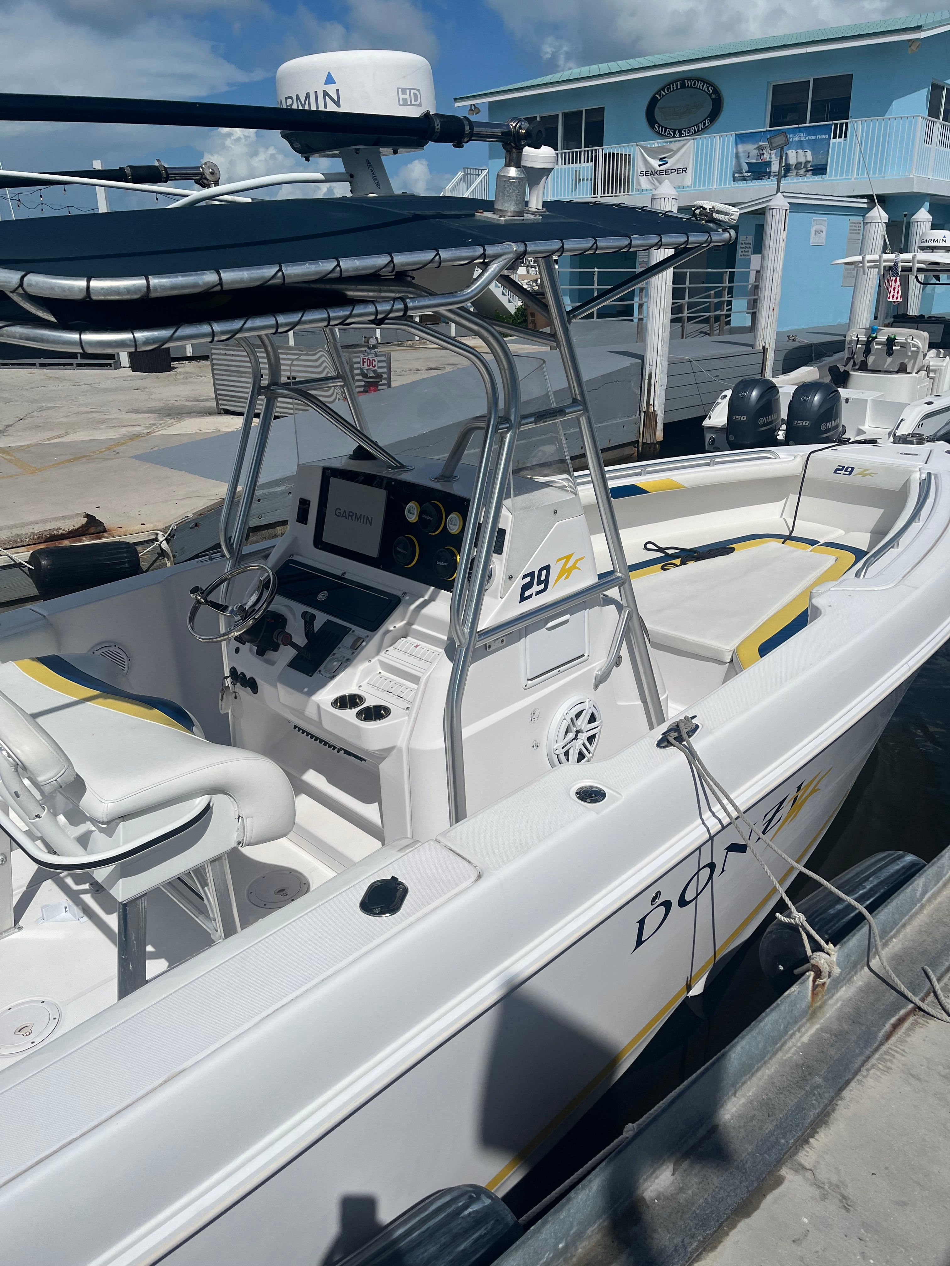 2001 Donzi 29 ZF boat docked with Garmin equipment.