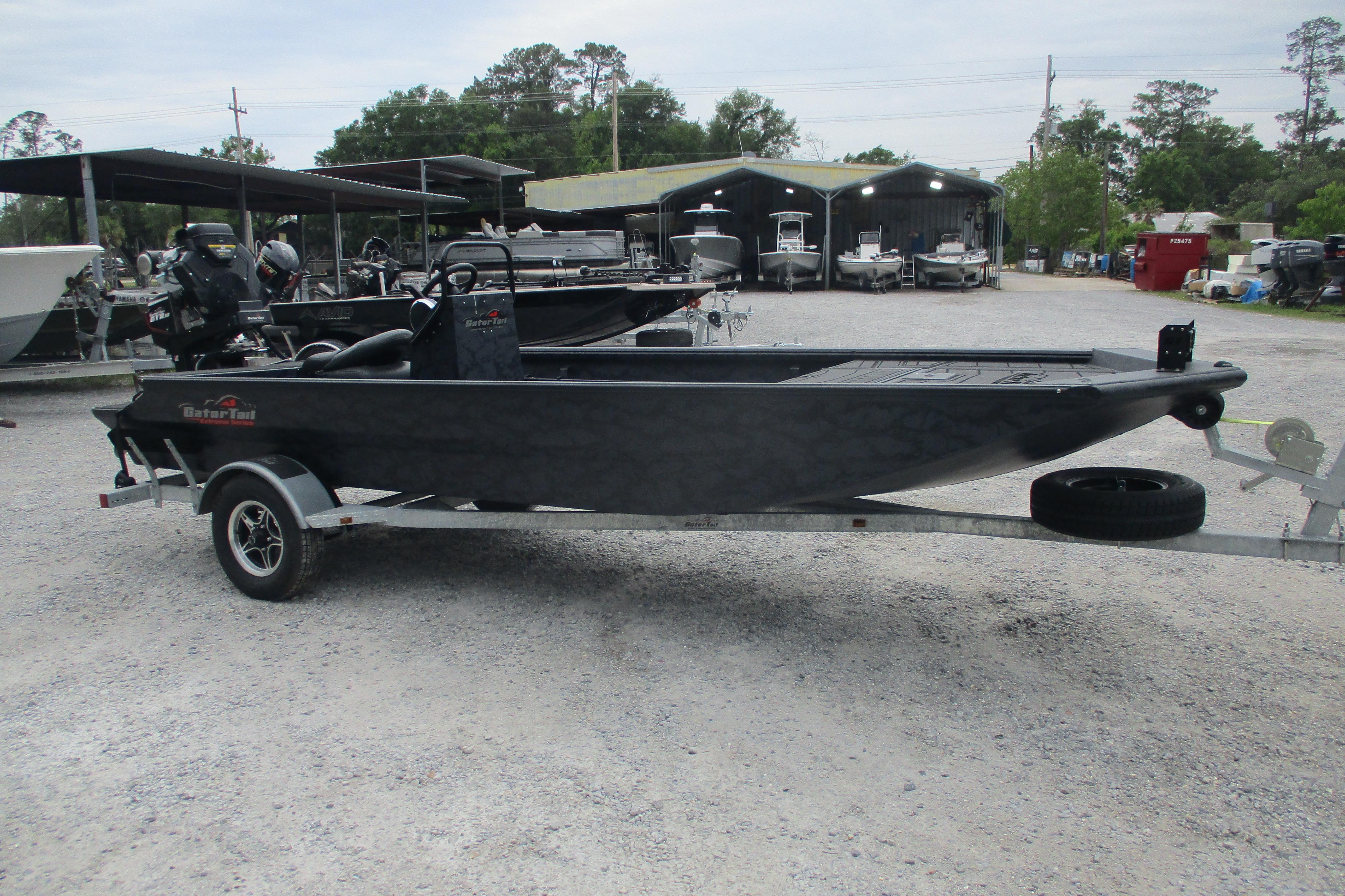 2026 Gator Tail 1860 Extreme CC boat on trailer in outdoor dealership setting.