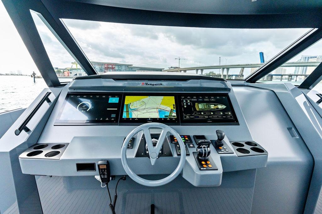 Cockpit of 2024 Vanquish Yachts VQ55 with advanced navigation displays and controls.
