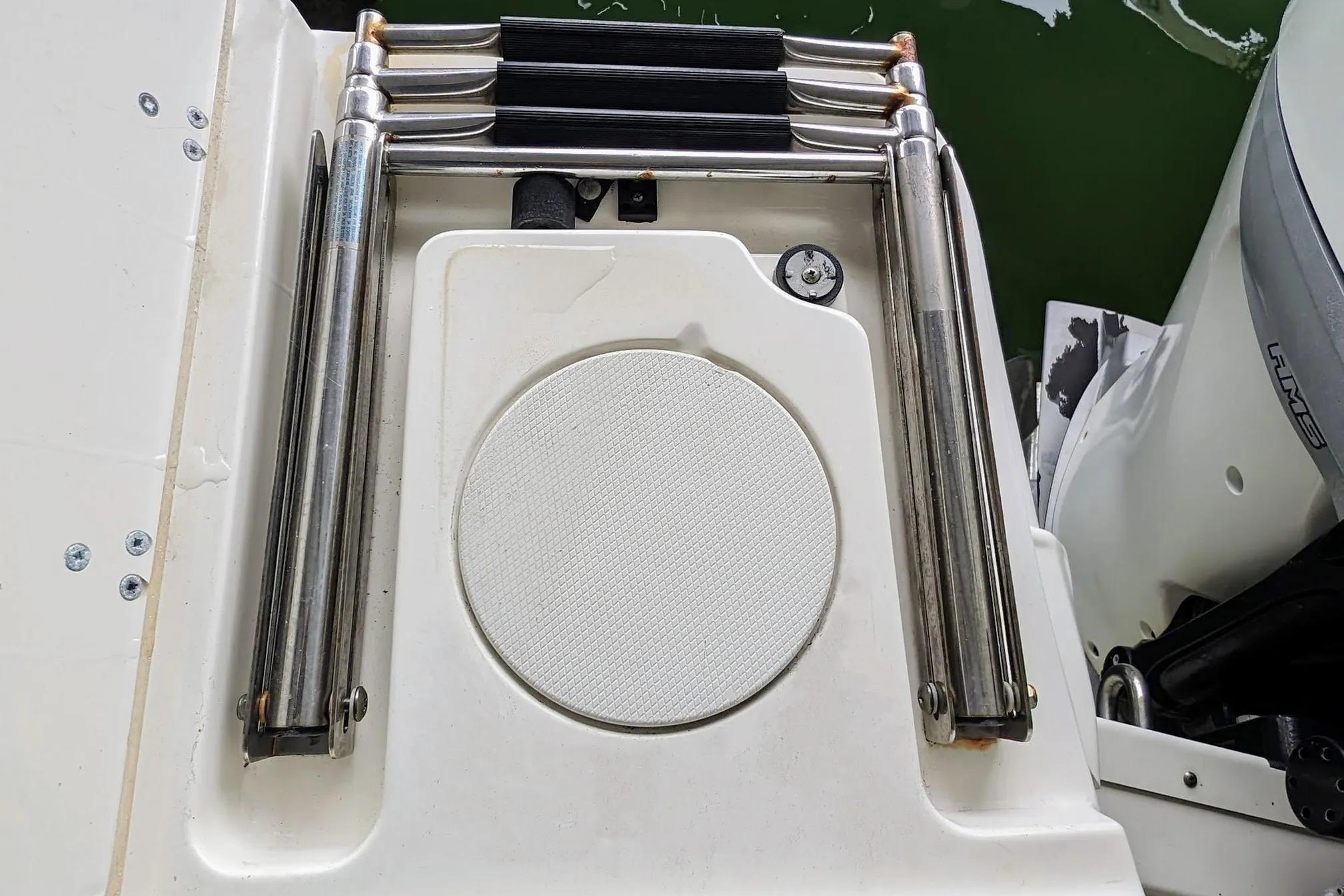 2017 Boston Whaler 320 Vantage swim platform with folded ladder.
