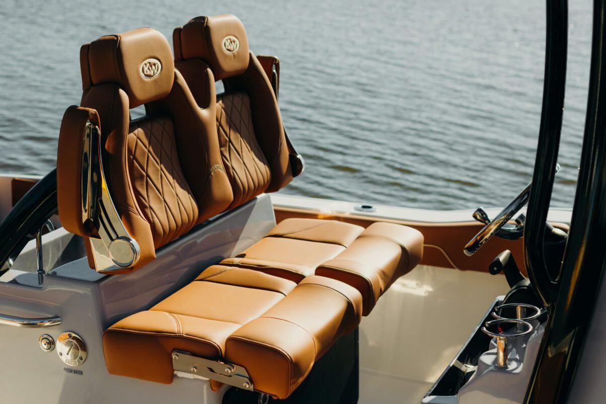 Manufacturer Provided Image: Luxurious seating on 2025 Key West 239 FSR boat, featuring brown leather upholstery.